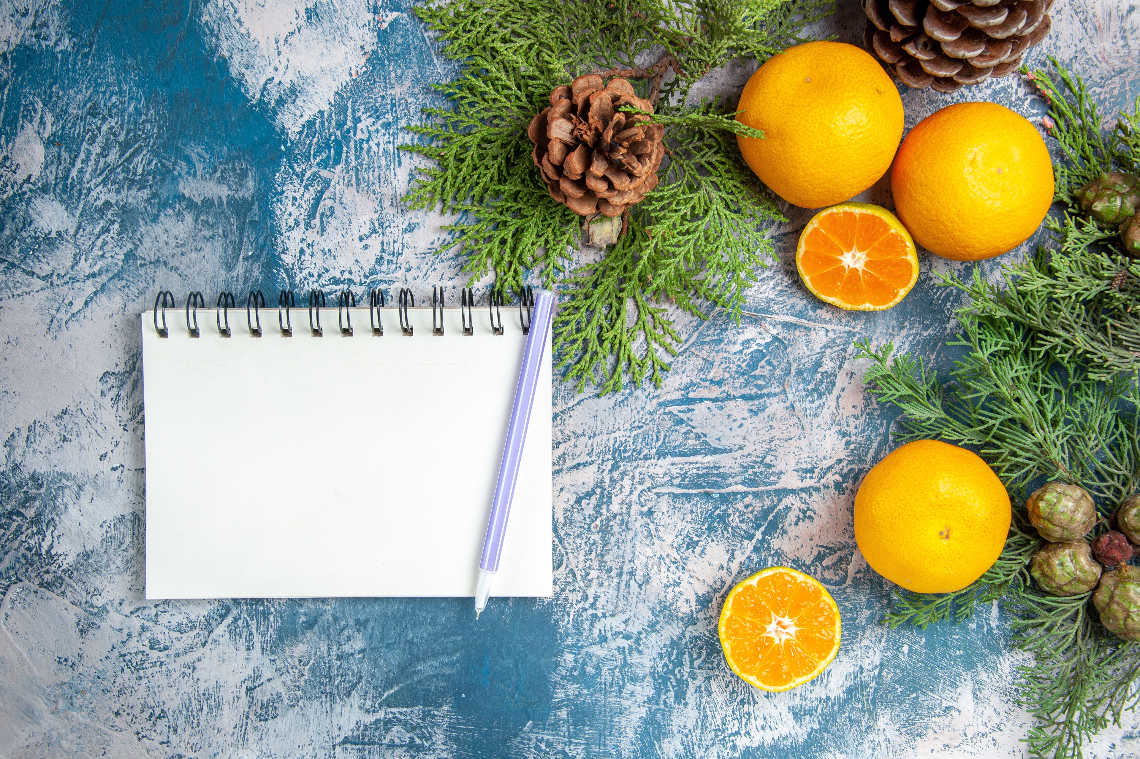 Christmas Flat Lay with Oranges and Pine Cones HD Wallpaper