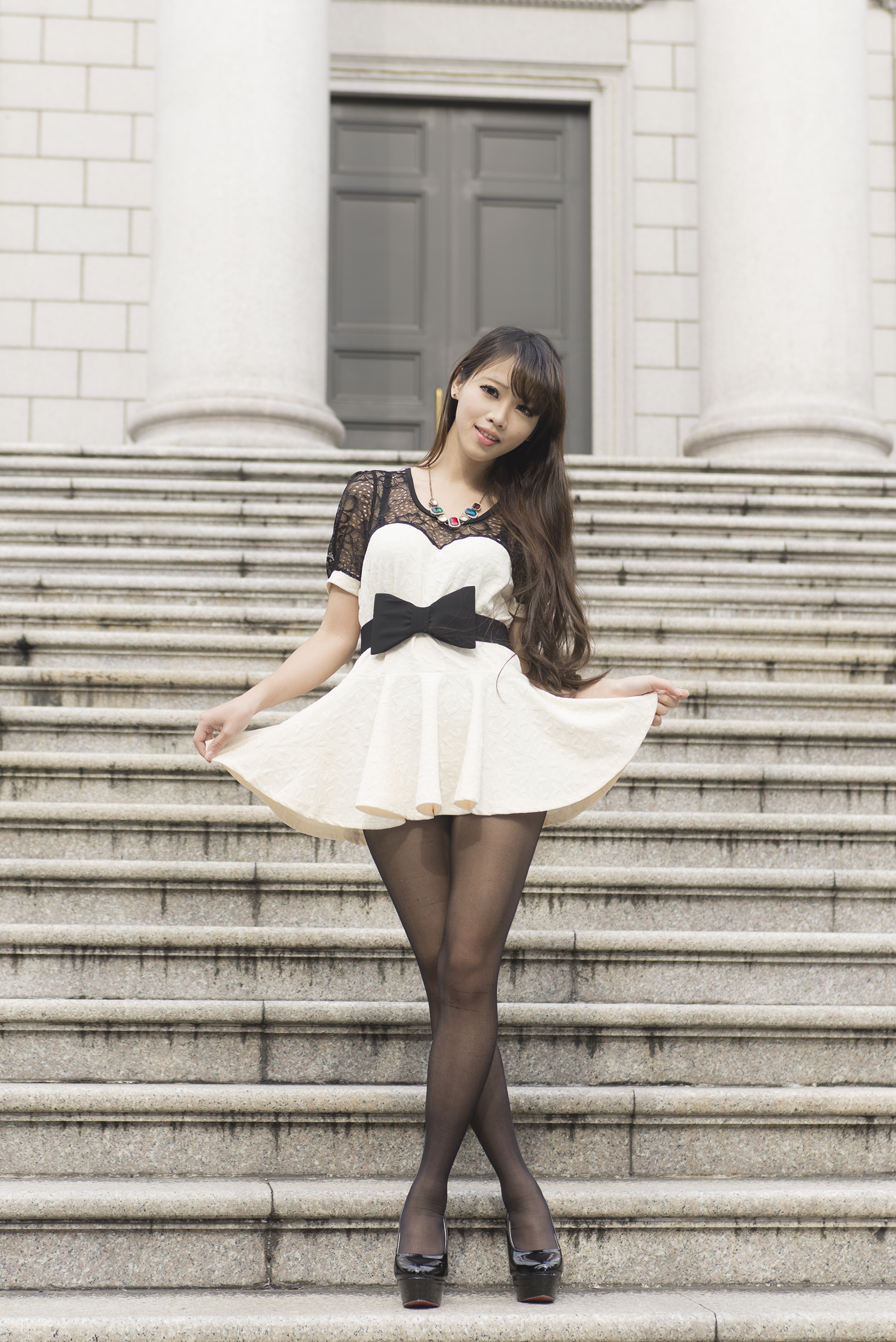 Asian woman in dress on stairs HD Phone Wallpaper