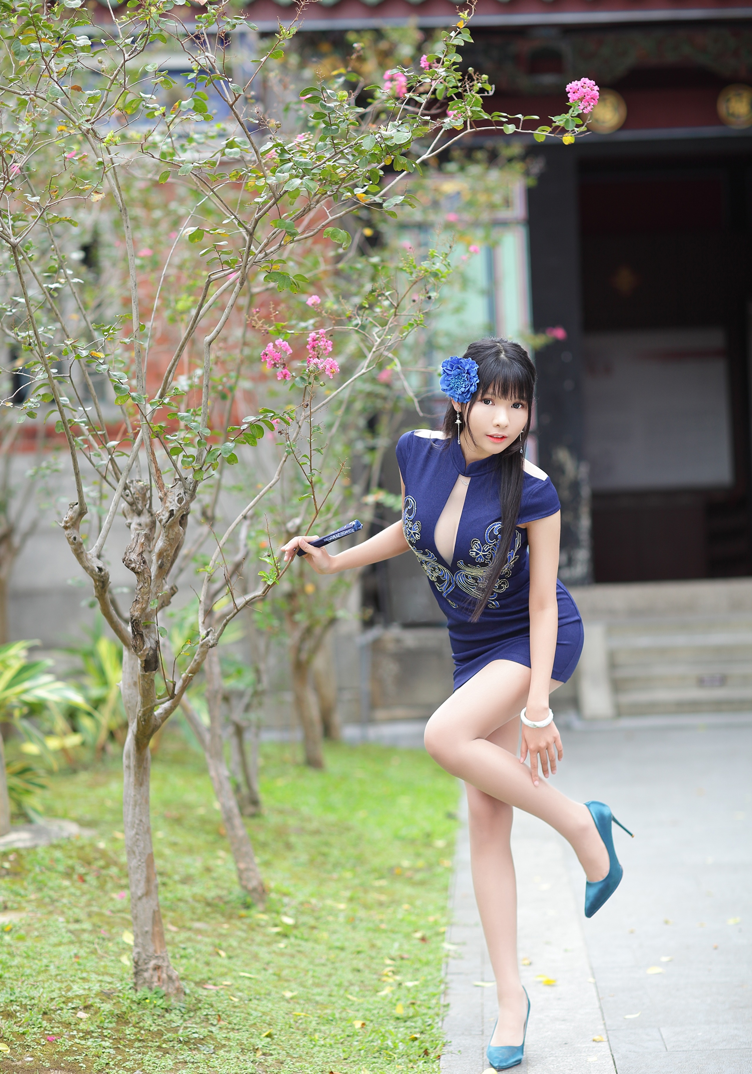 Asian woman in a blue dress posing outdoors HD Phone Wallpaper