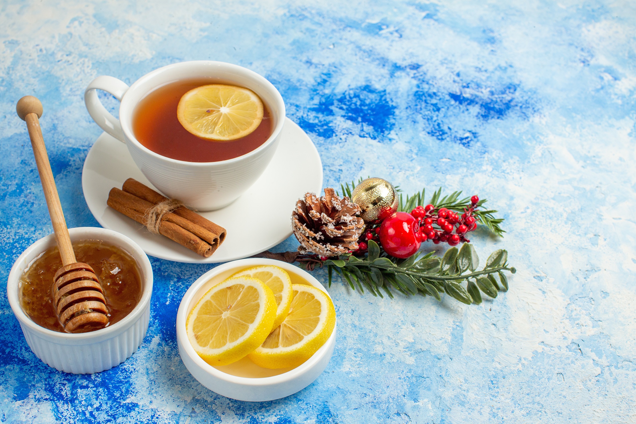 Tea with lemon, honey, and cinnamon with Christmas decor HD Wallpaper