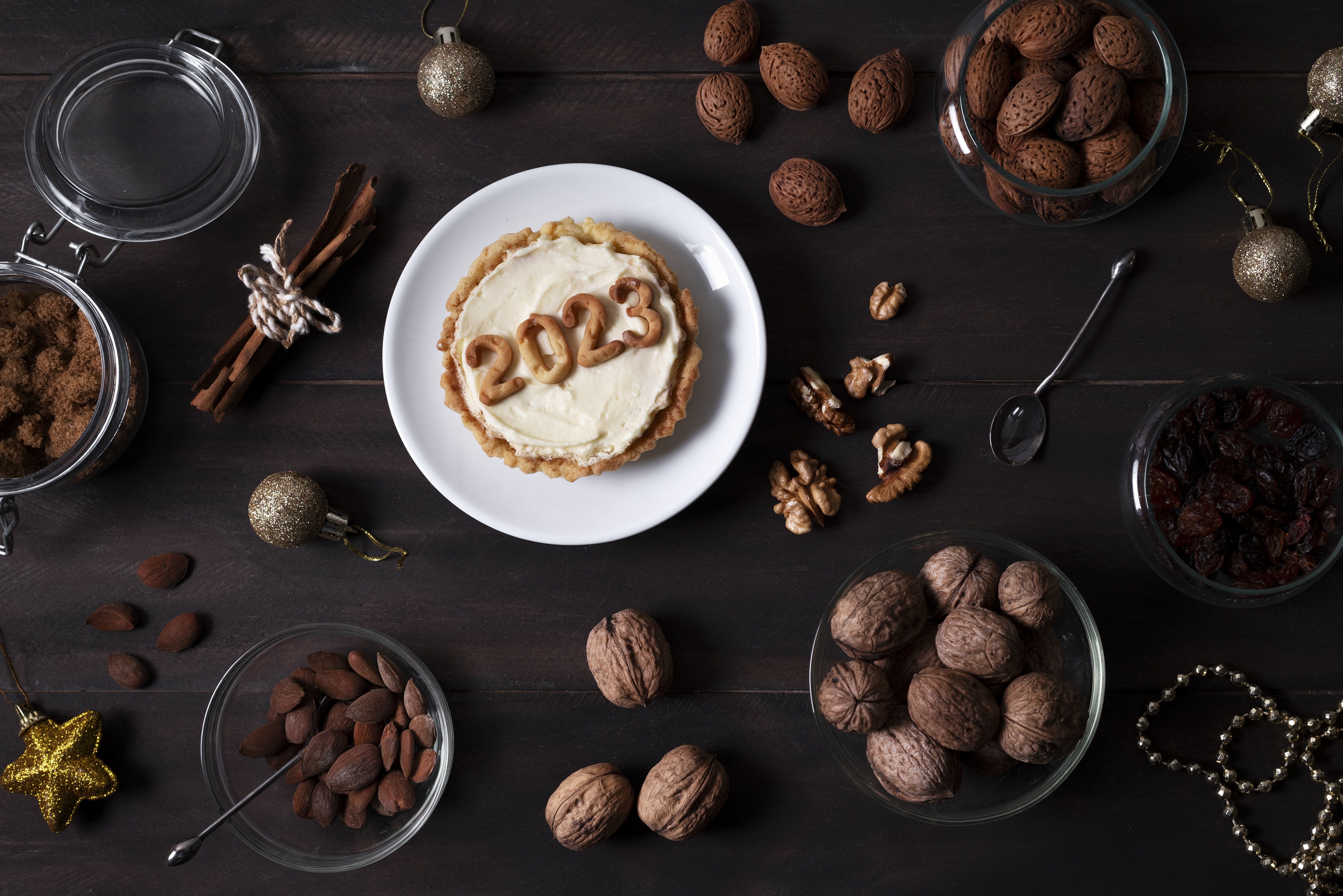 New Year's Tart with 2023 decoration and nuts HD Wallpaper