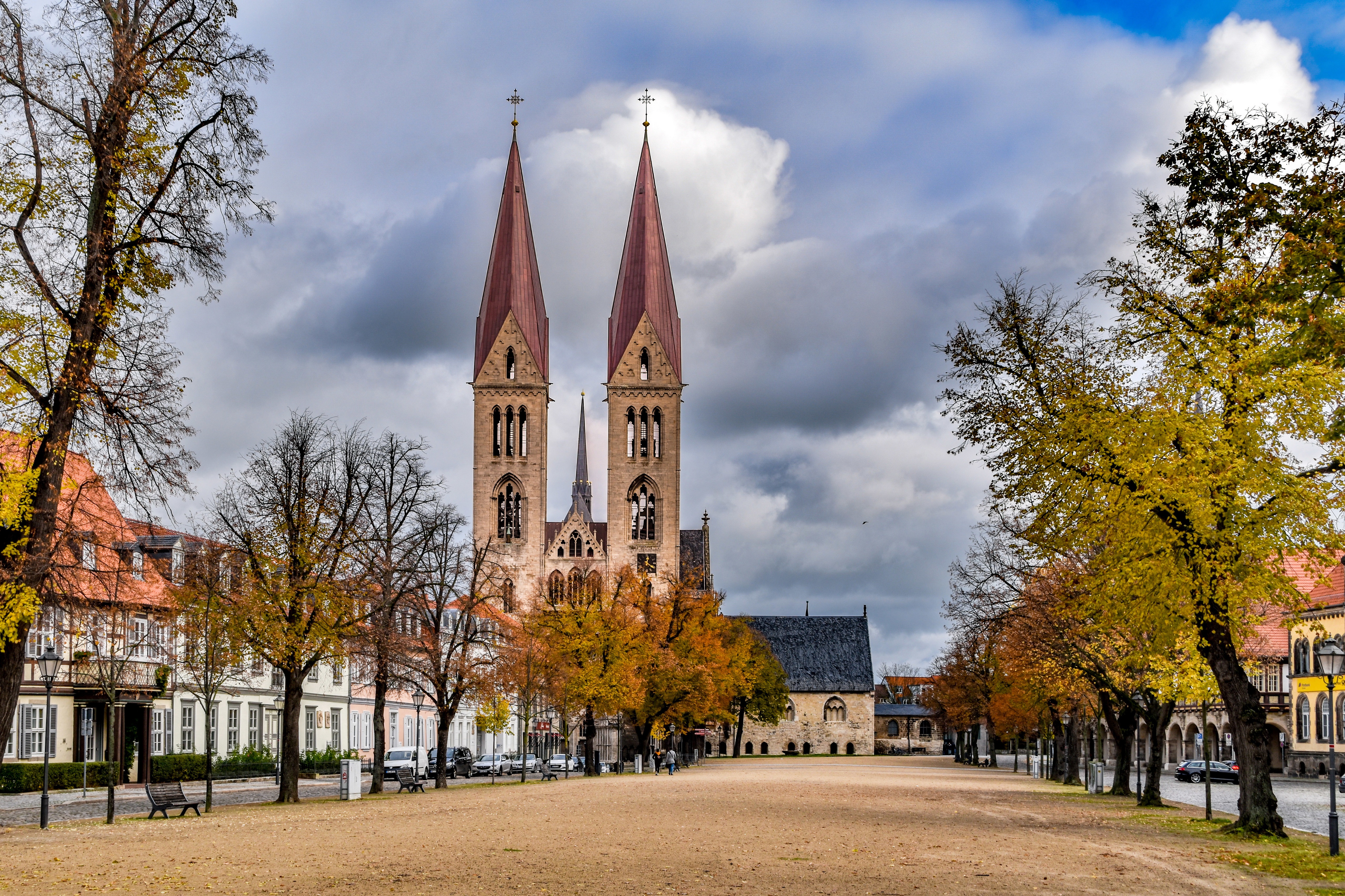 Halberstadt Germany Avenue with Church Towers and Autumn Trees HD Wallpaper
