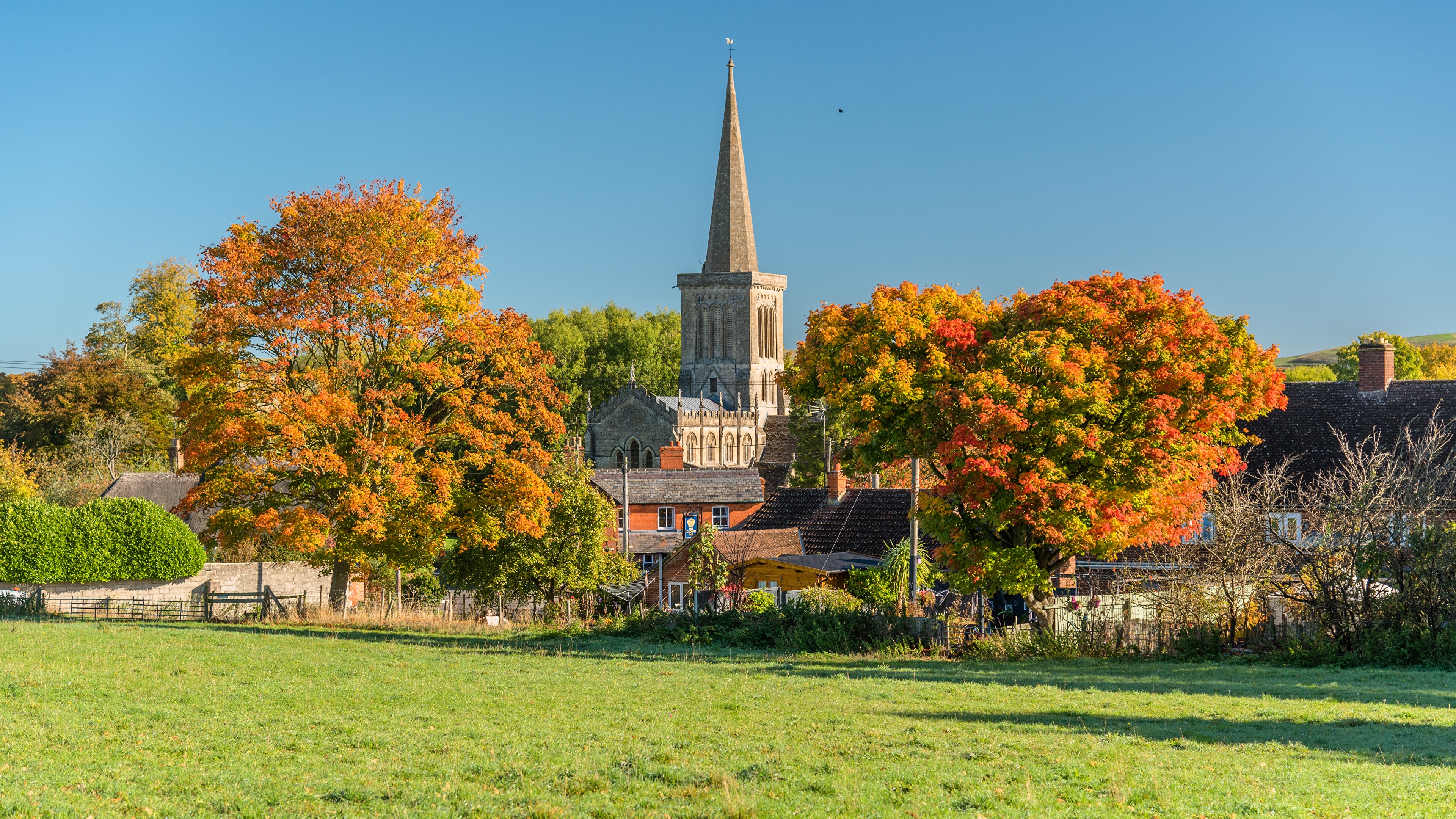 Church in Bishops Cannings, England during Autumn HD Wallpaper