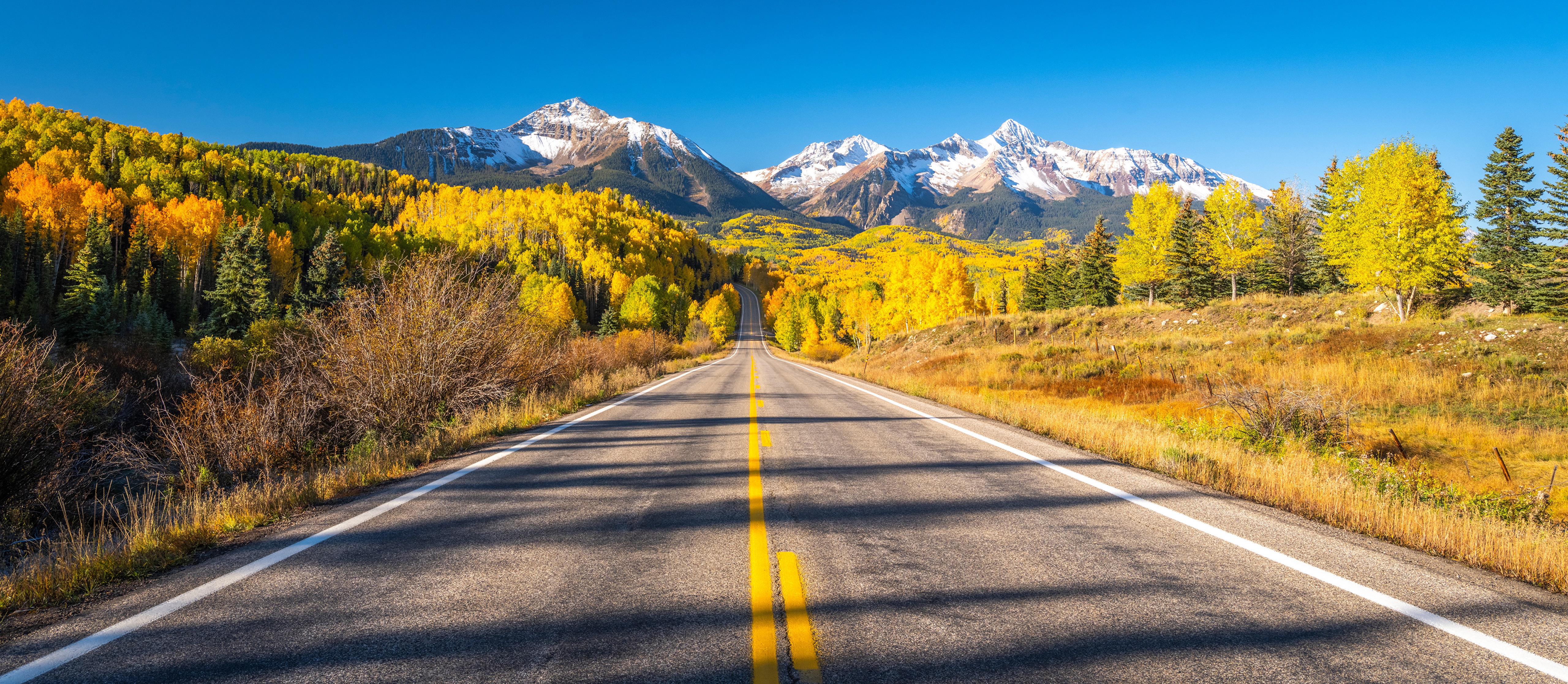 Road through autumn mountains in Colorado, USA HD Wallpaper