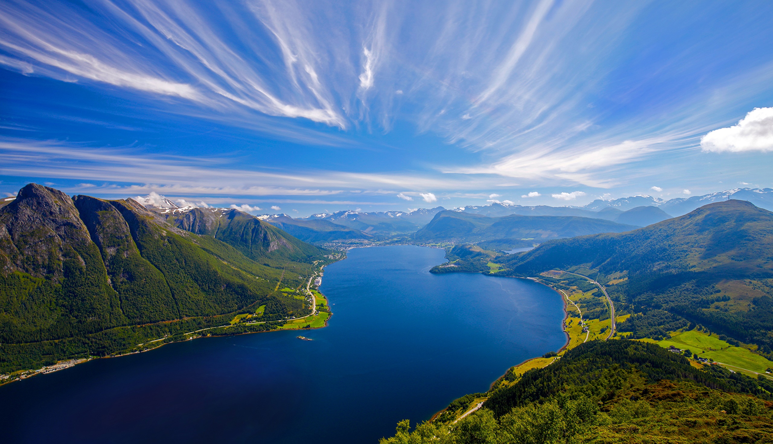 Scenic view of a Norwegian fjord with mountains and sky HD Wallpaper