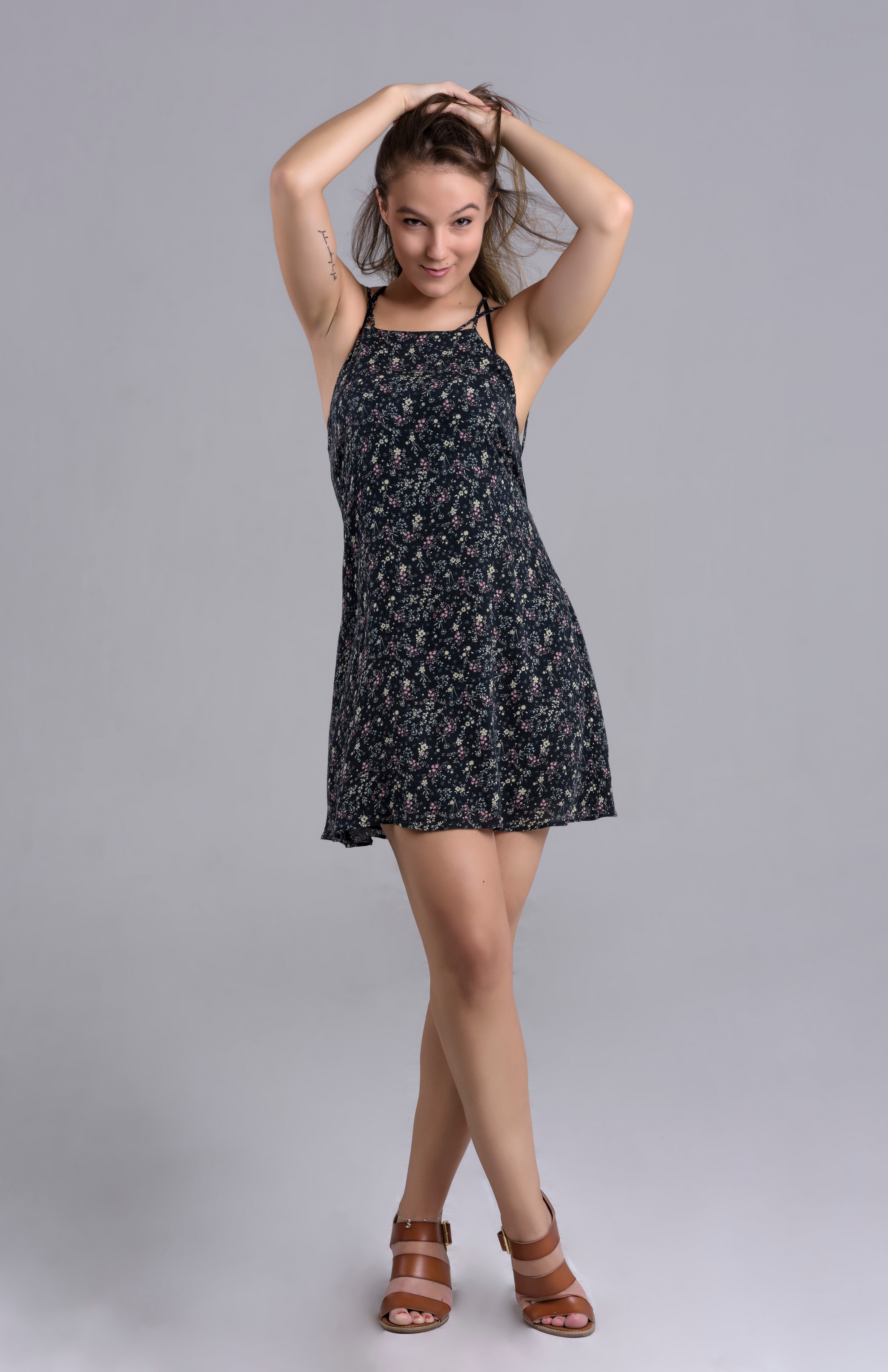 Mika in a floral dress posing HD Phone Wallpaper