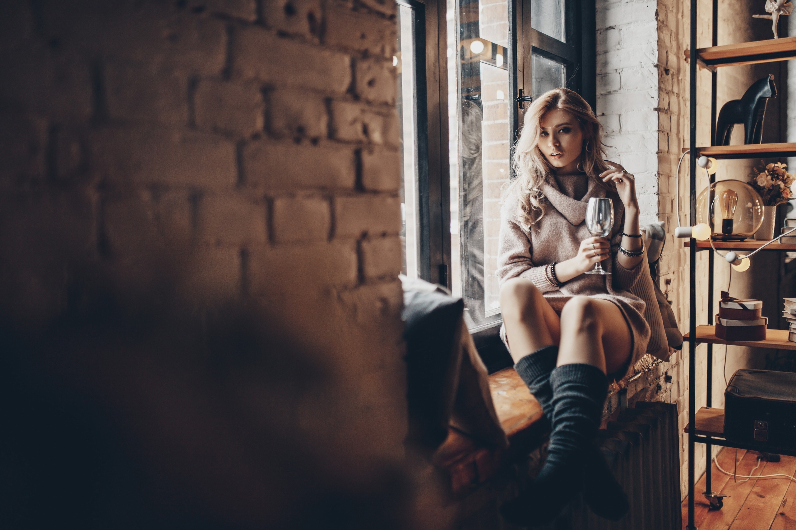 Irina Klimenko sitting by the window with a glass HD Wallpaper