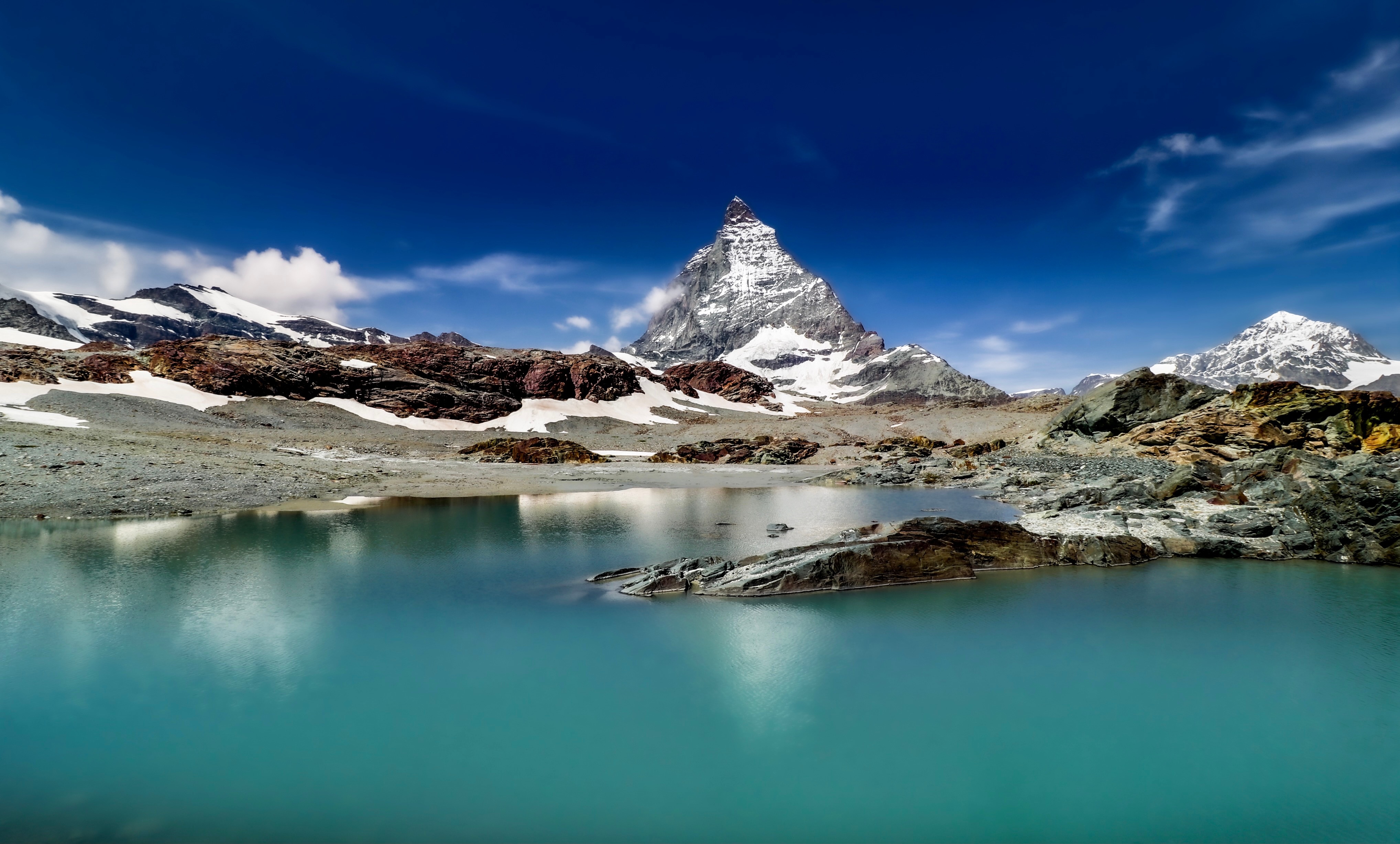 Matterhorn mountain reflected in a lake, Alps, Switzerland HD Wallpaper