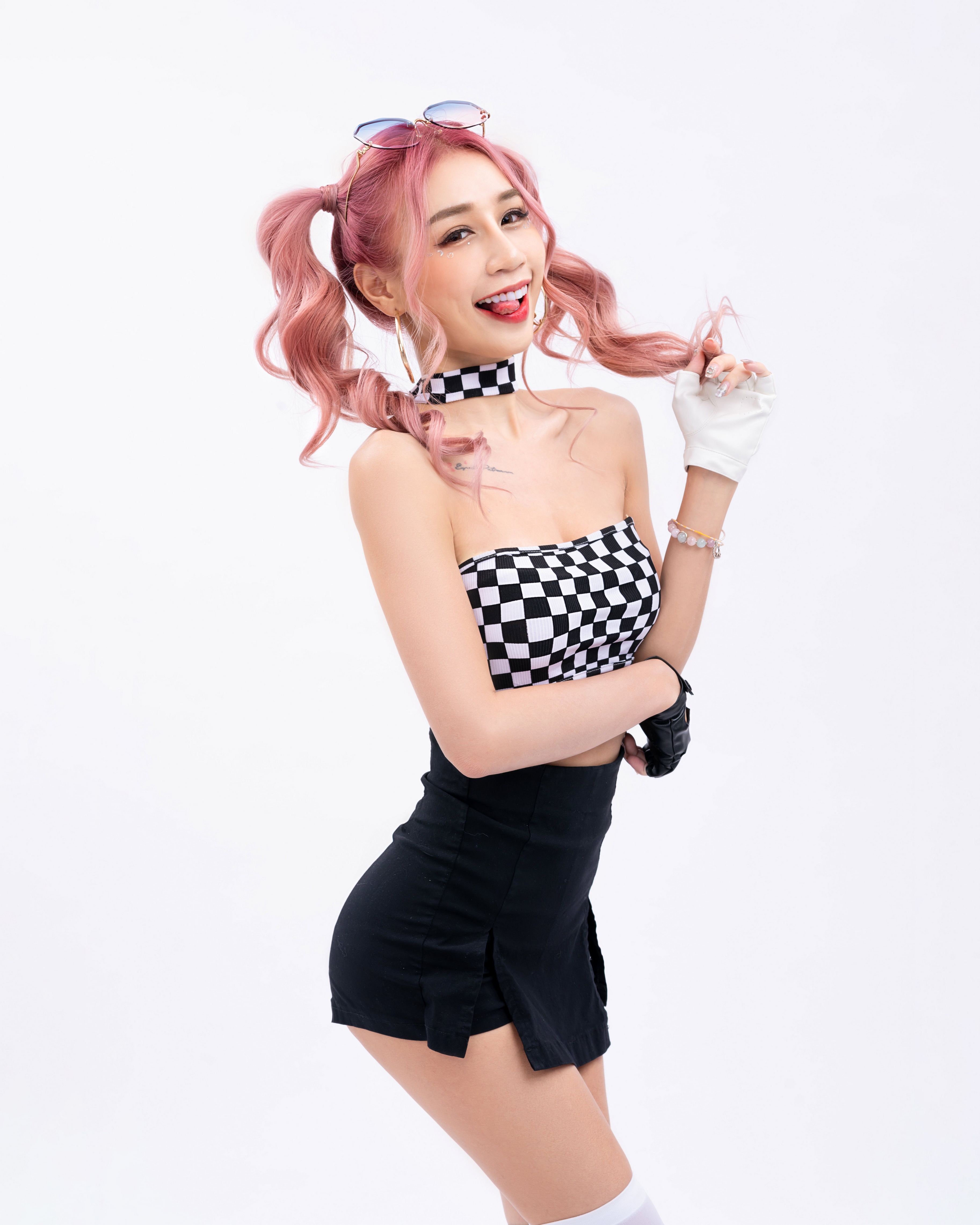 Asian woman with pink pigtails wearing checkered top and skirt HD Phone Wallpaper