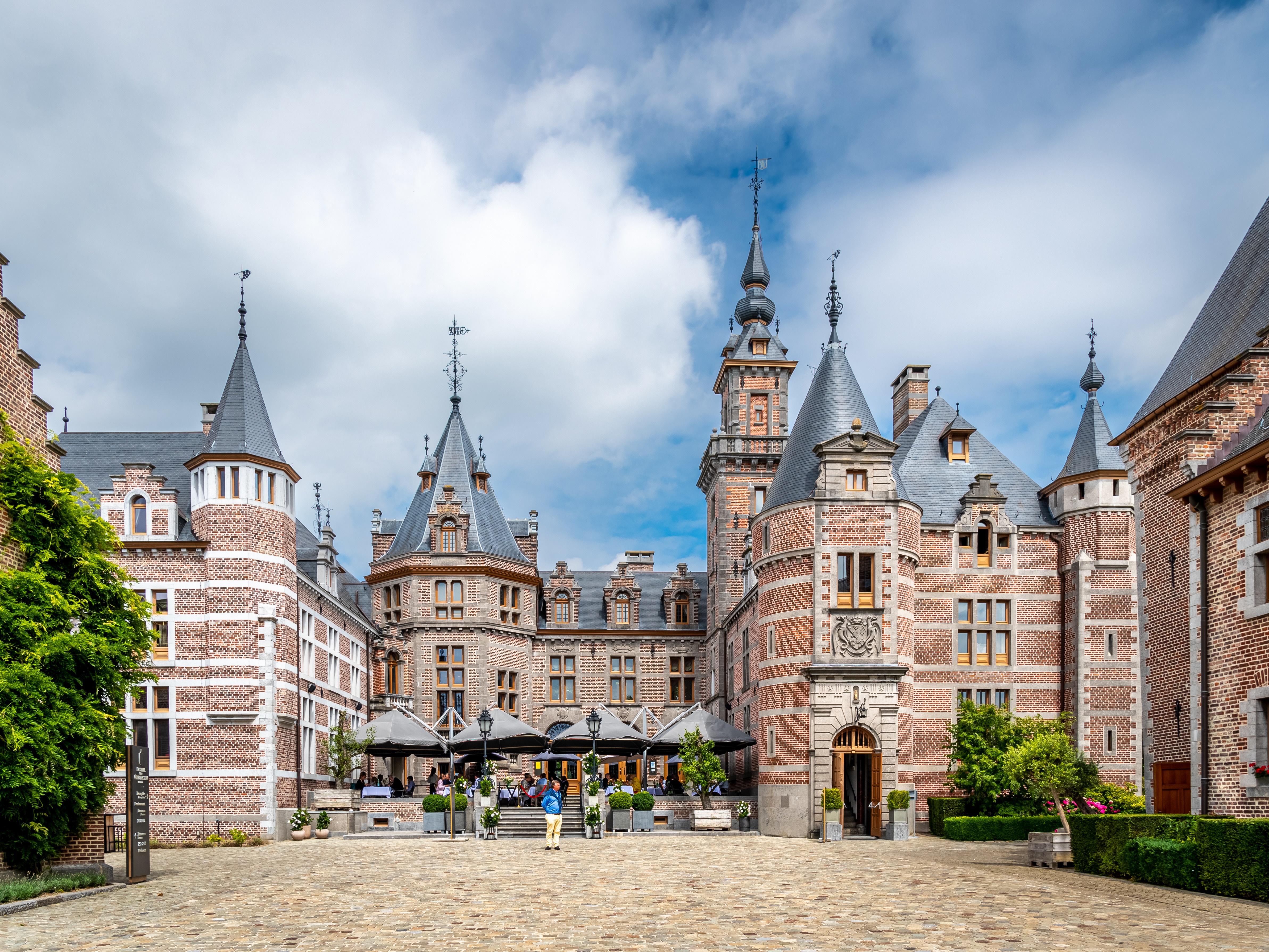 Castle in Ordingen, Belgium with Towers and Hotel HD Wallpaper