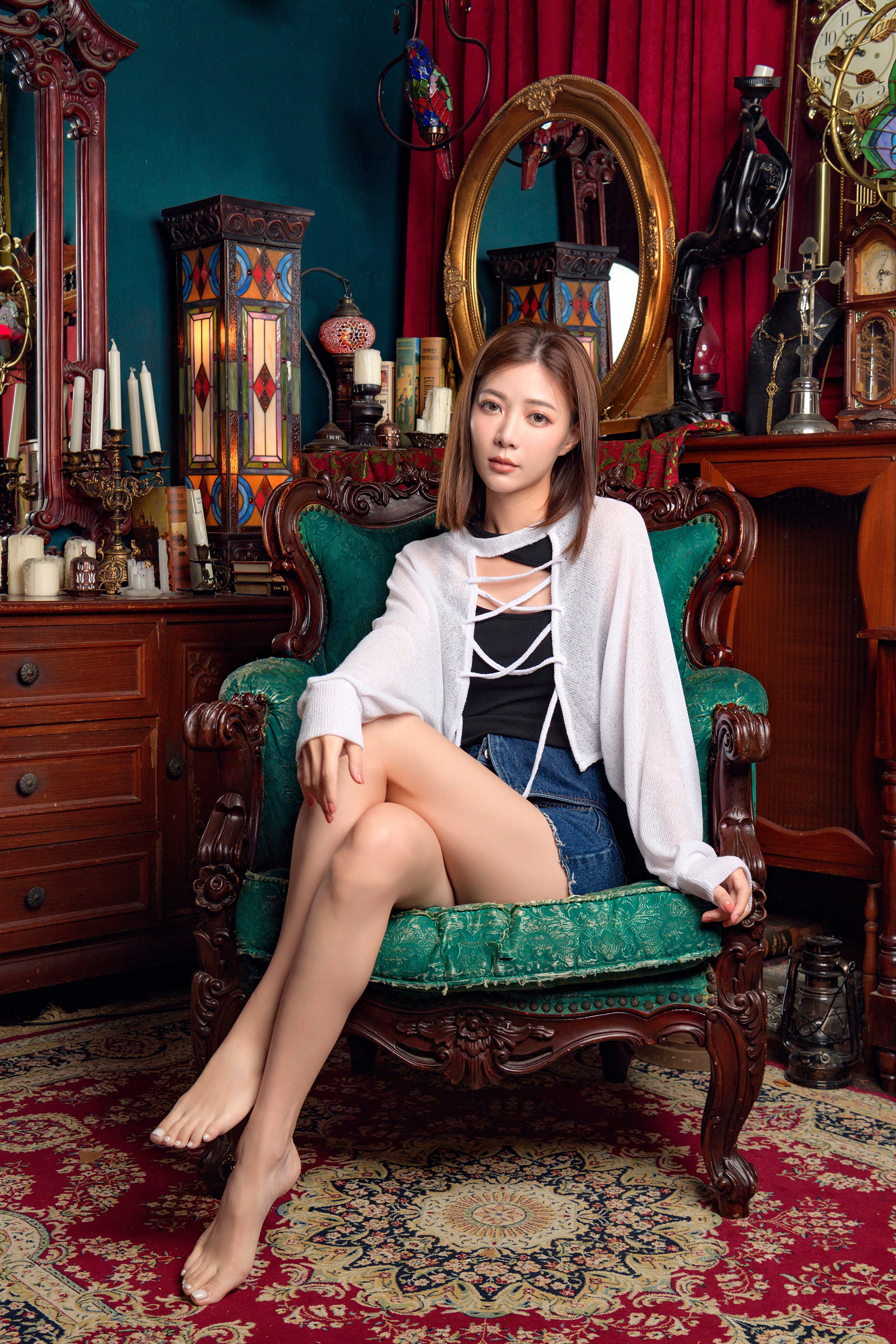 Asian woman sitting in an armchair HD Phone Wallpaper