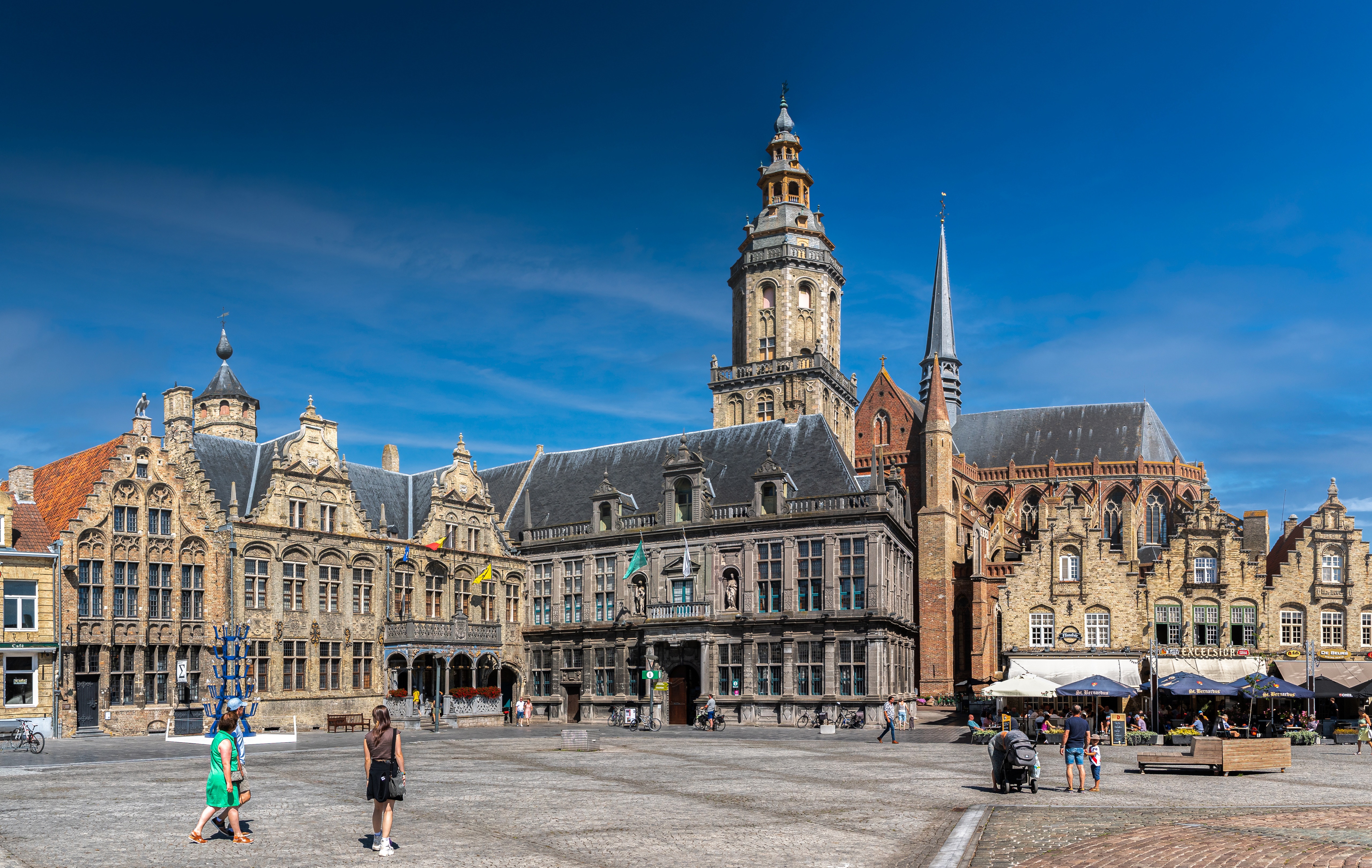Veurne Town Square with historic buildings and tower, Belgium HD Wallpaper