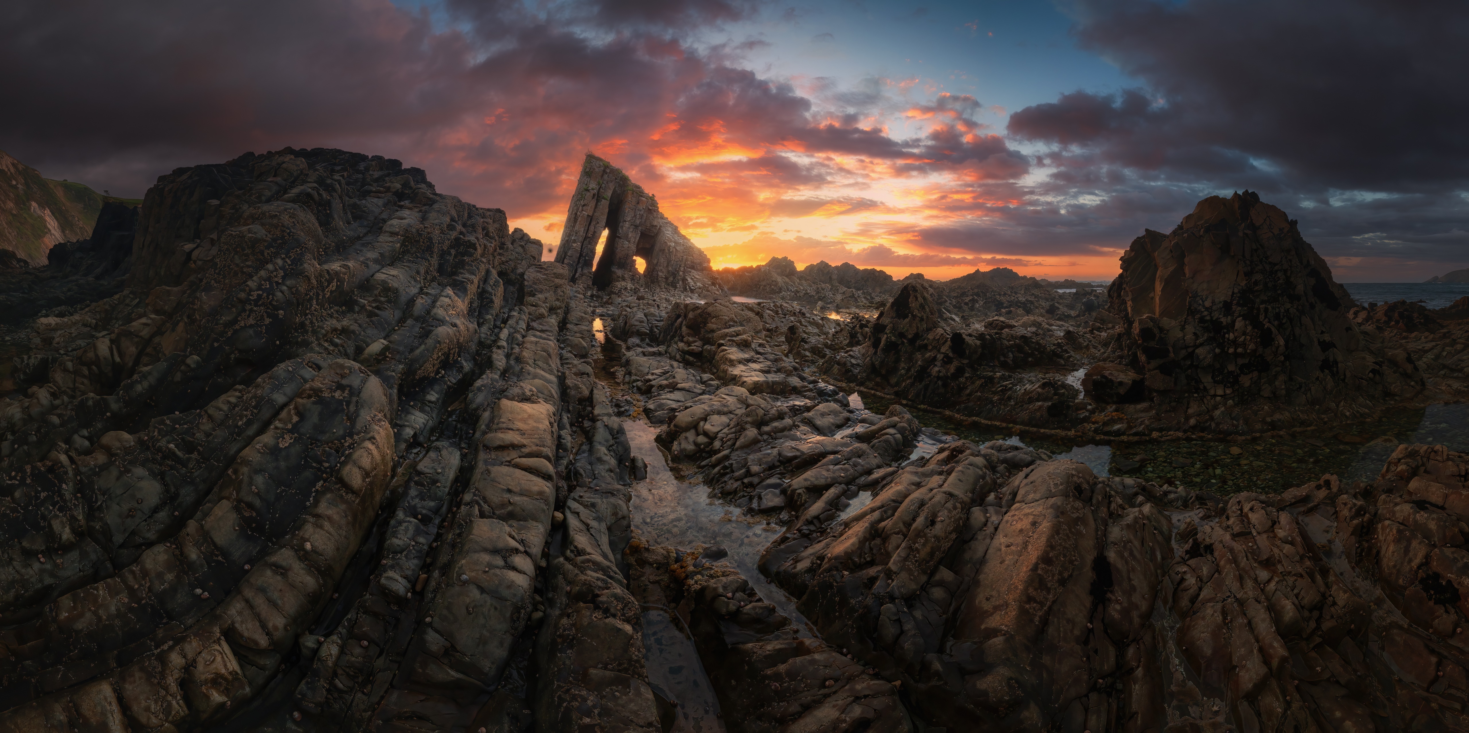 Rocky Coastline at Sunset in Asturias, Spain HD Wallpaper