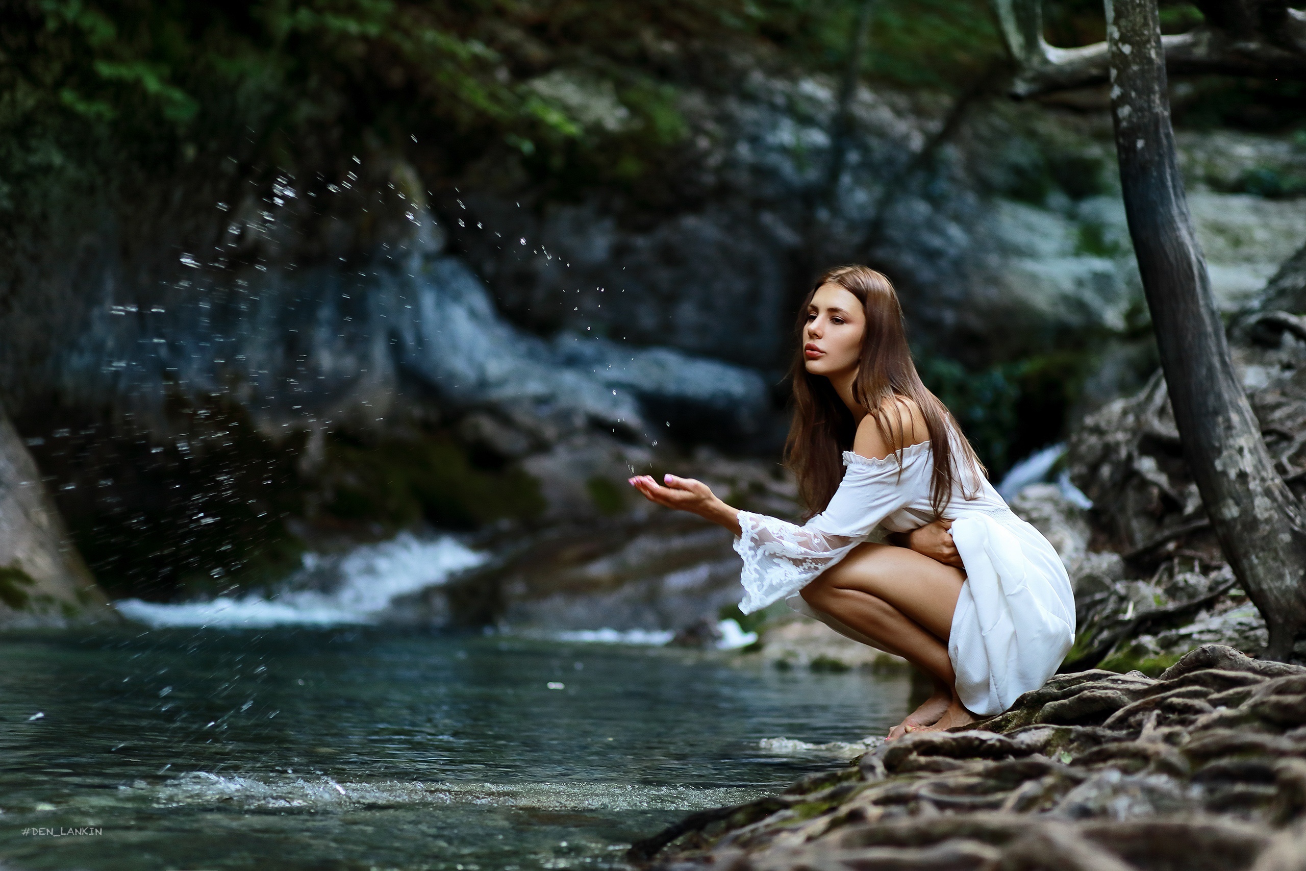 Tonya Smirnova by a stream with water splashes HD Wallpaper