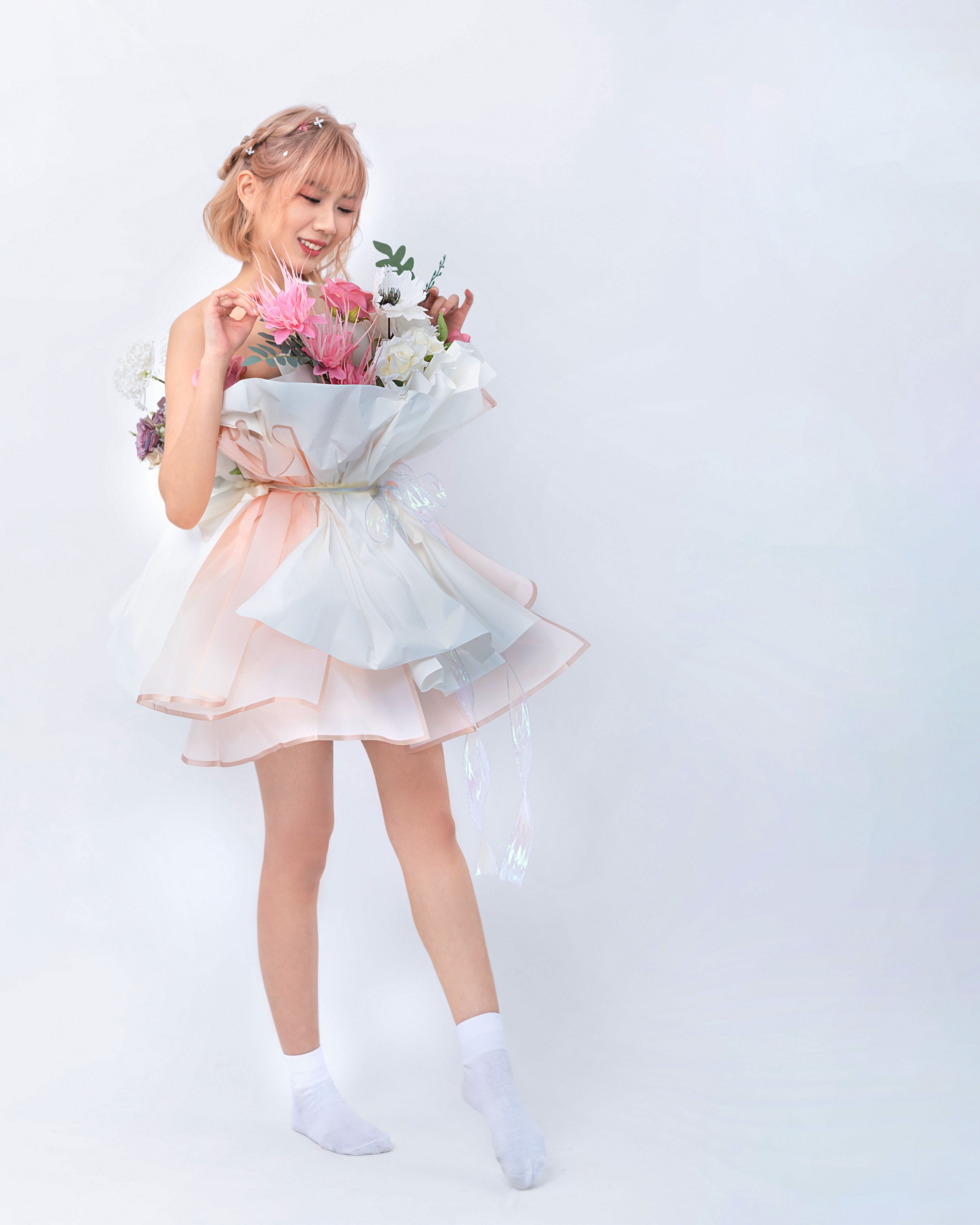 Asian girl in dress holding flowers HD Phone Wallpaper