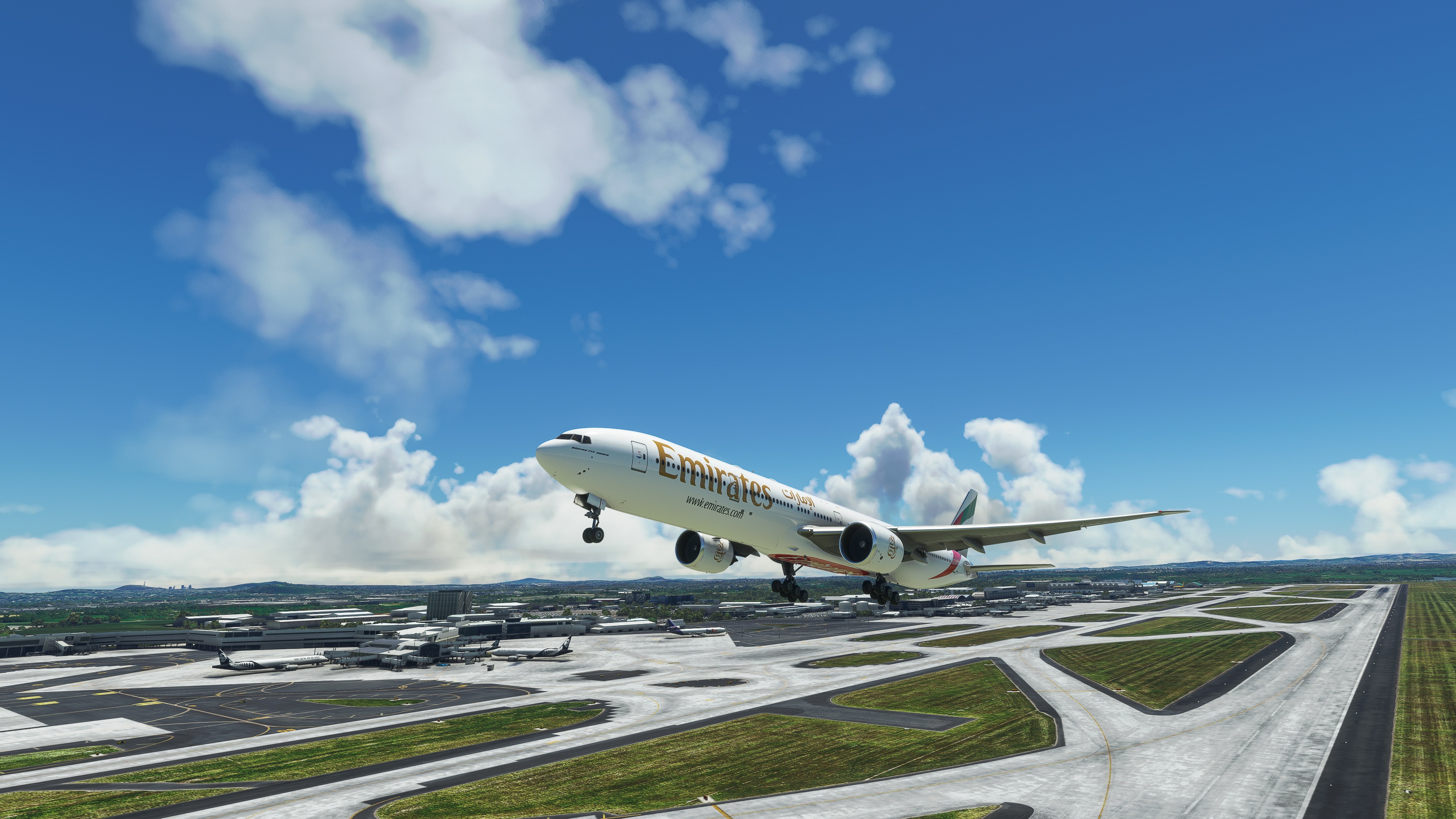 Emirates Boeing 777-300ER taking off from airport HD Wallpaper