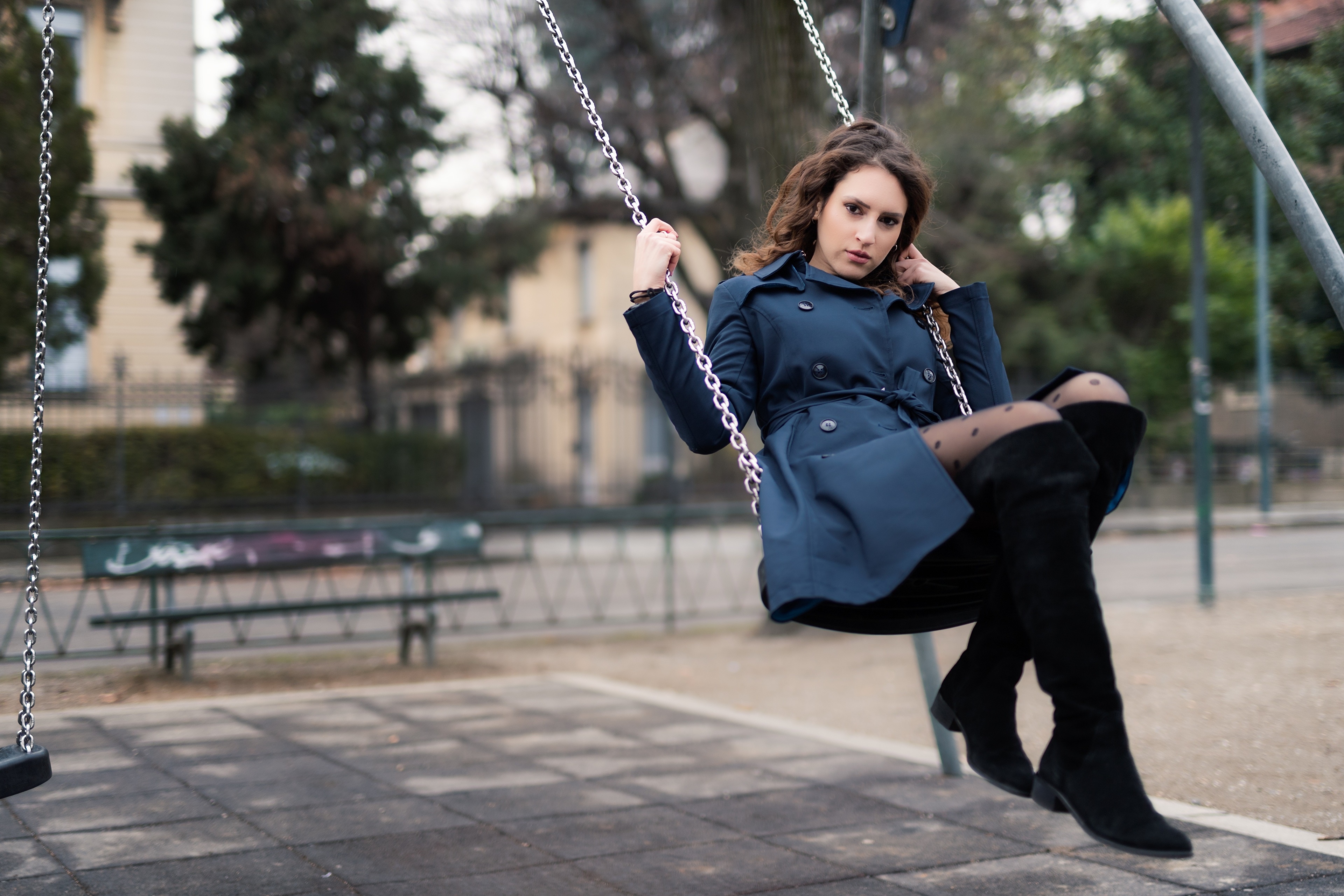 Chiara on a swing in a park HD Wallpaper