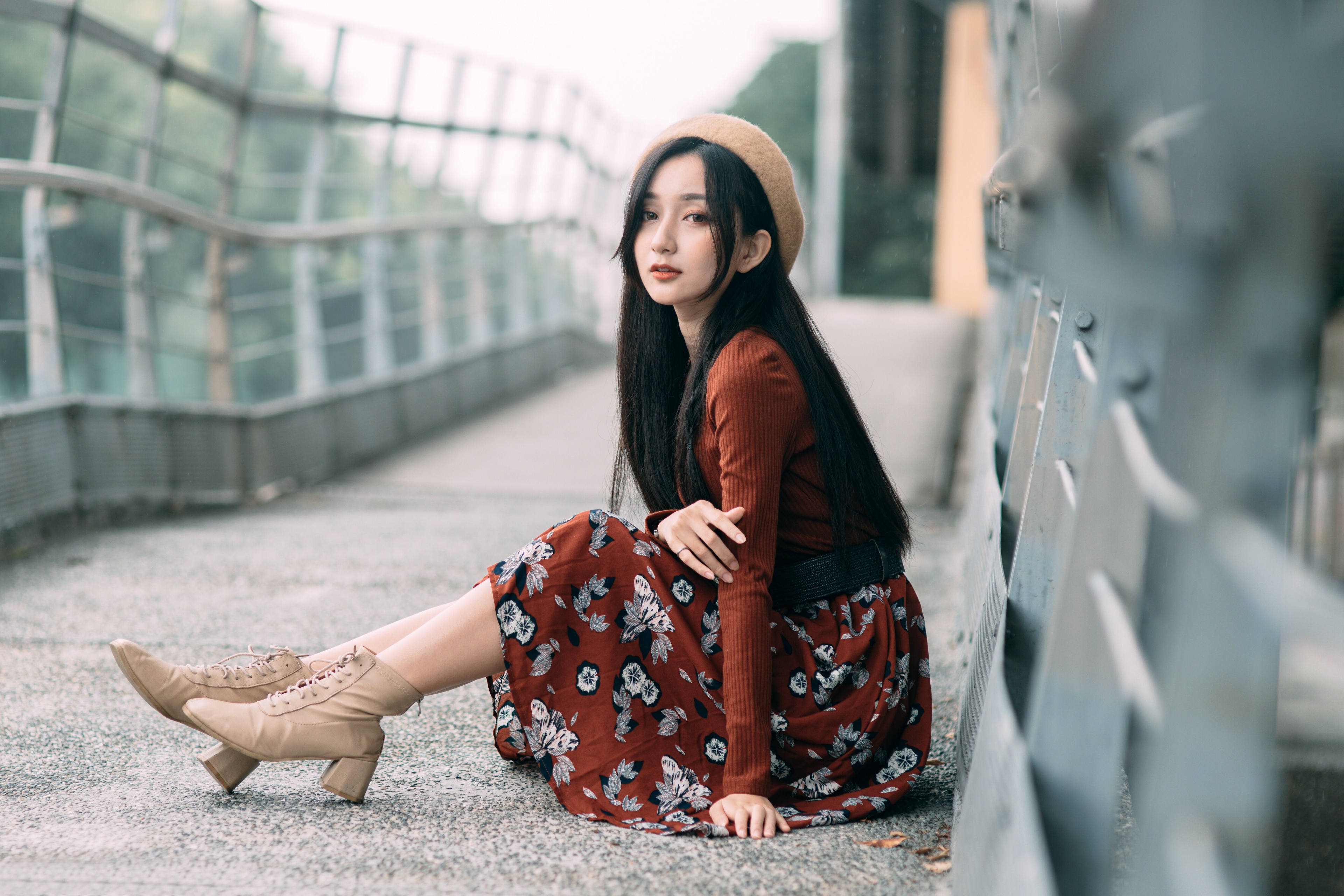 Asian girl wearing a beret and dress sitting on a bridge HD Wallpaper