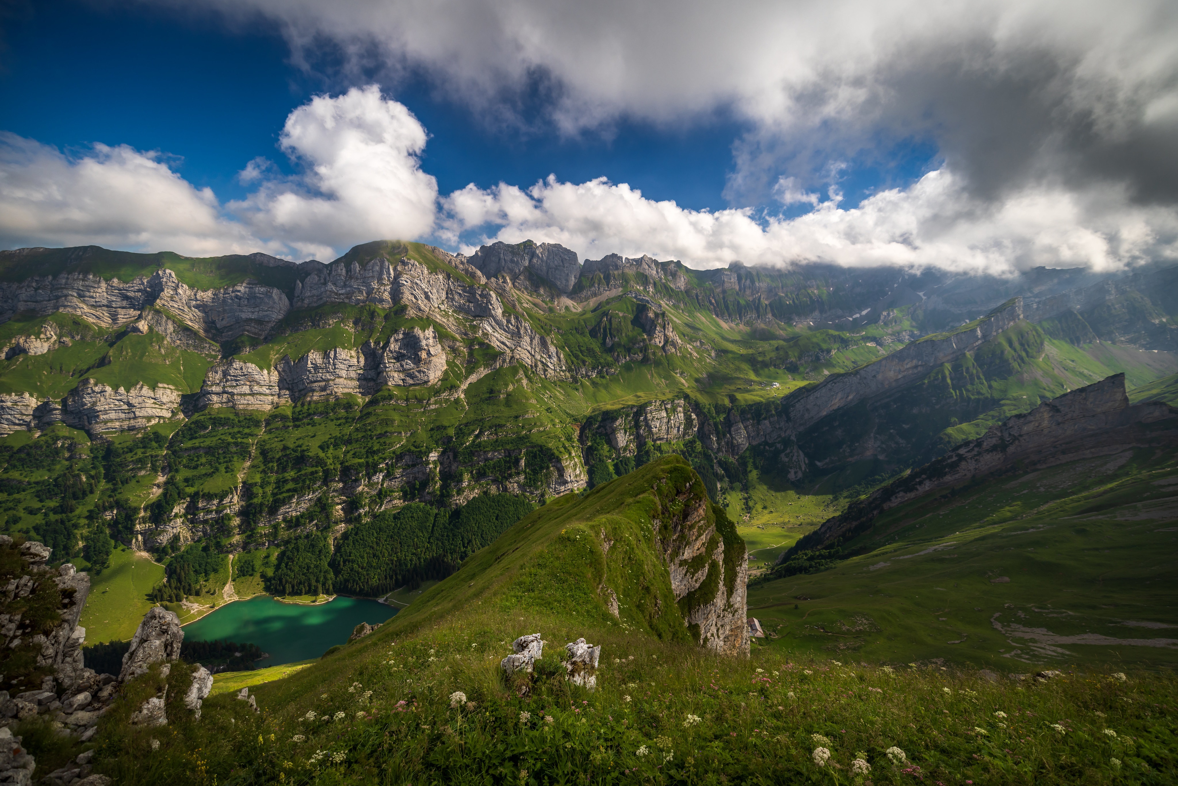 4K Seealpsee Lake in the Swiss Alps with Mountains and Clouds HD Wallpaper