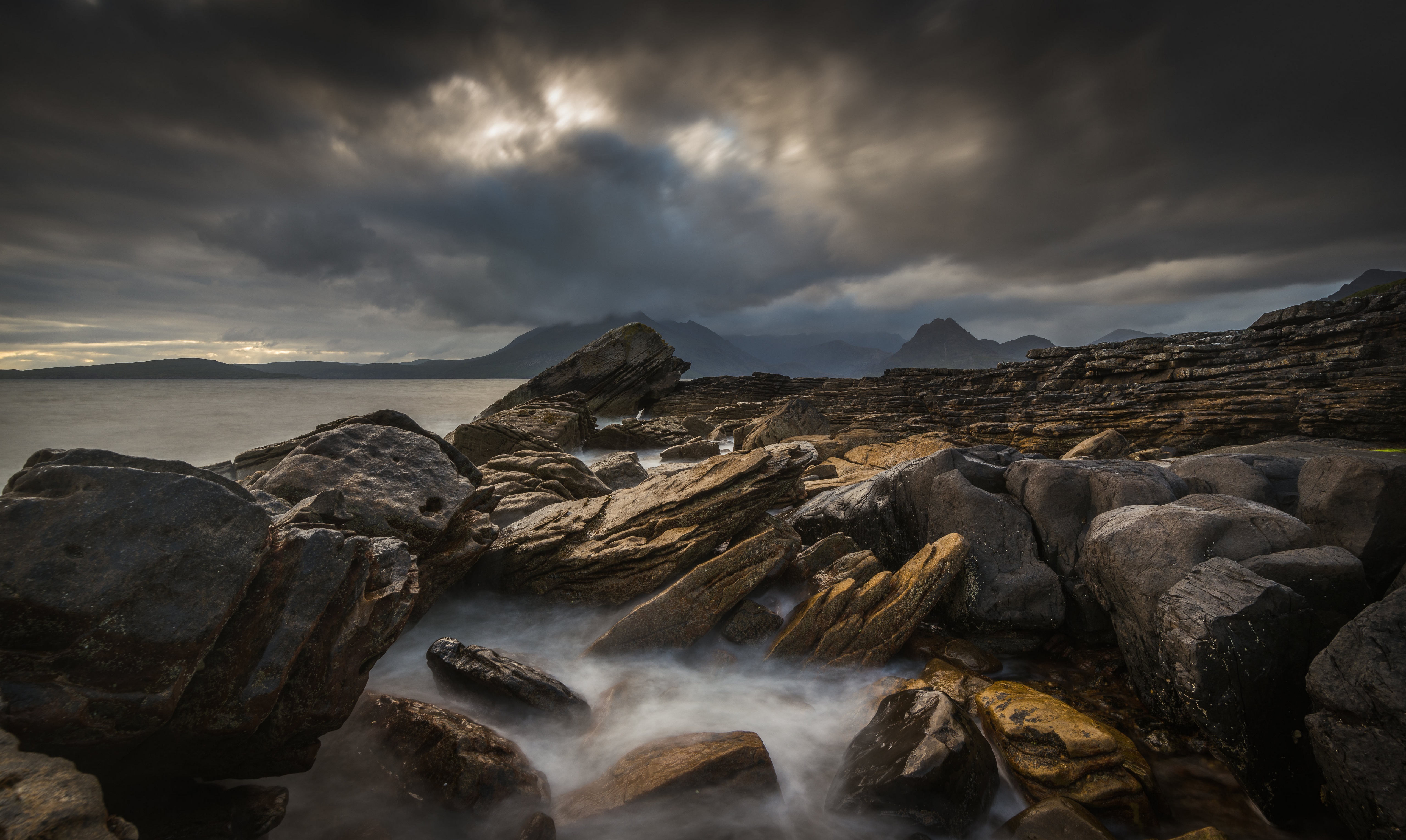 Scotland Coast with Rocky Shoreline and Dramatic Clouds HD Wallpaper