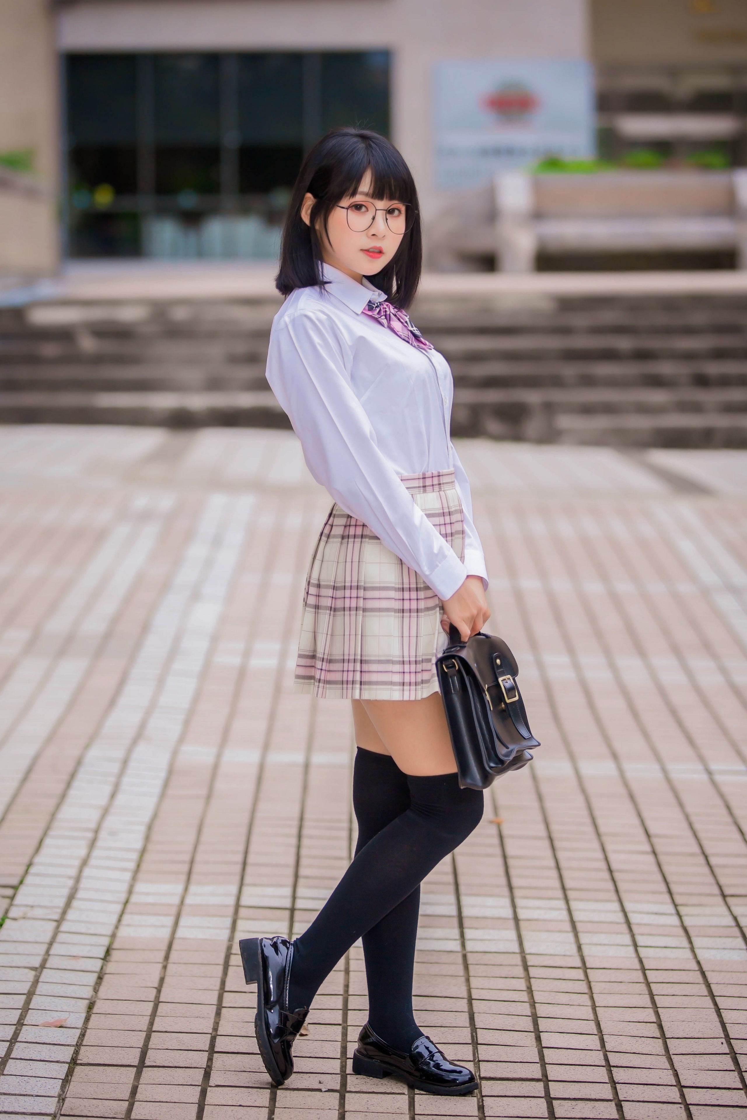 Asian girl in school uniform with glasses and briefcase HD Phone Wallpaper