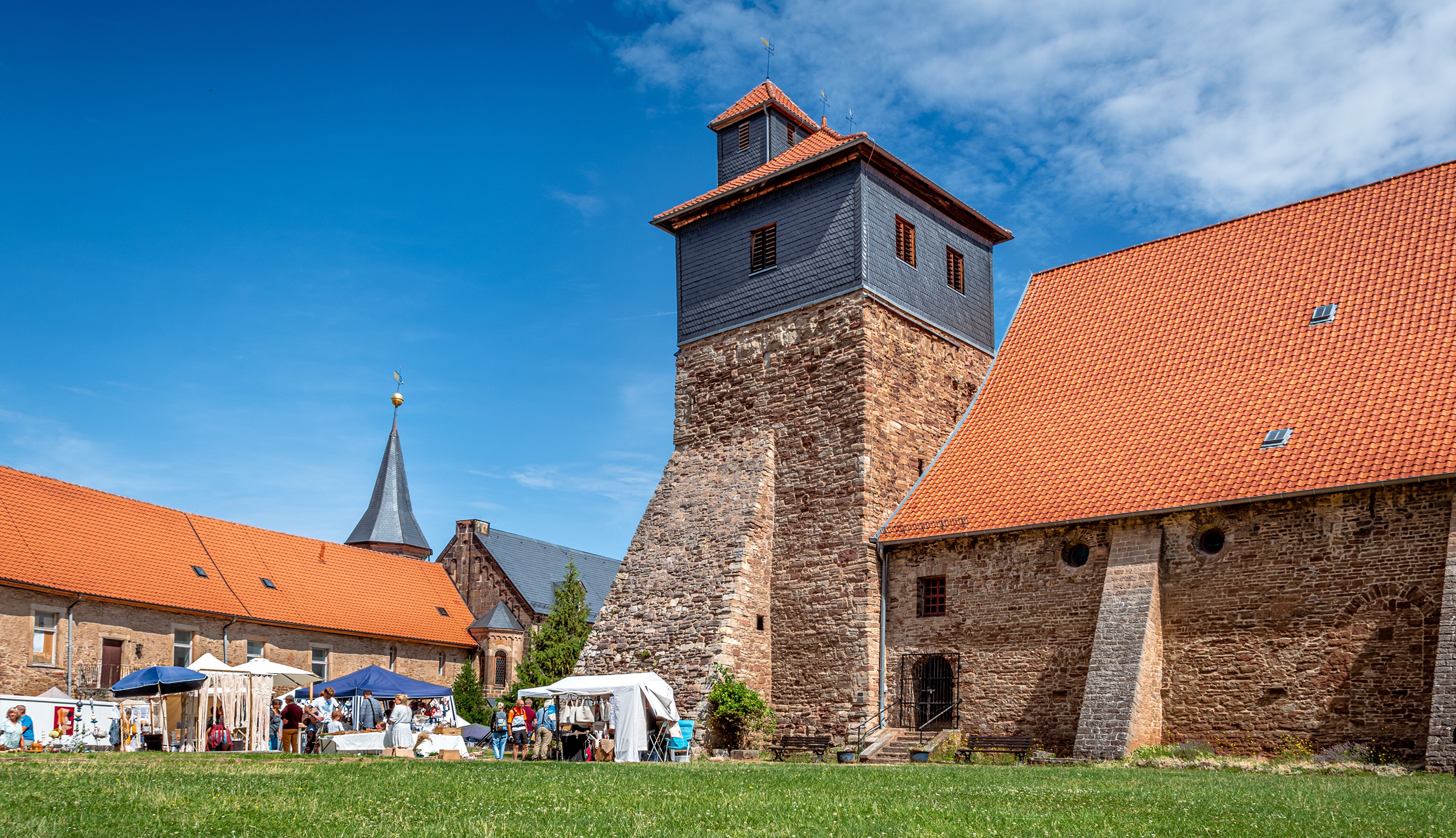 Ilsenburg Monastery with Market Stalls and Tower HD Wallpaper
