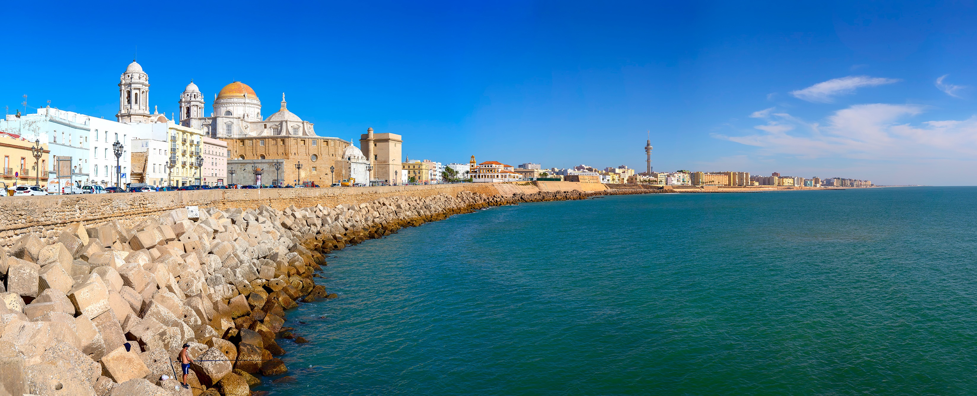 Cadiz Cathedral and coastline with sea and breakwater HD Wallpaper