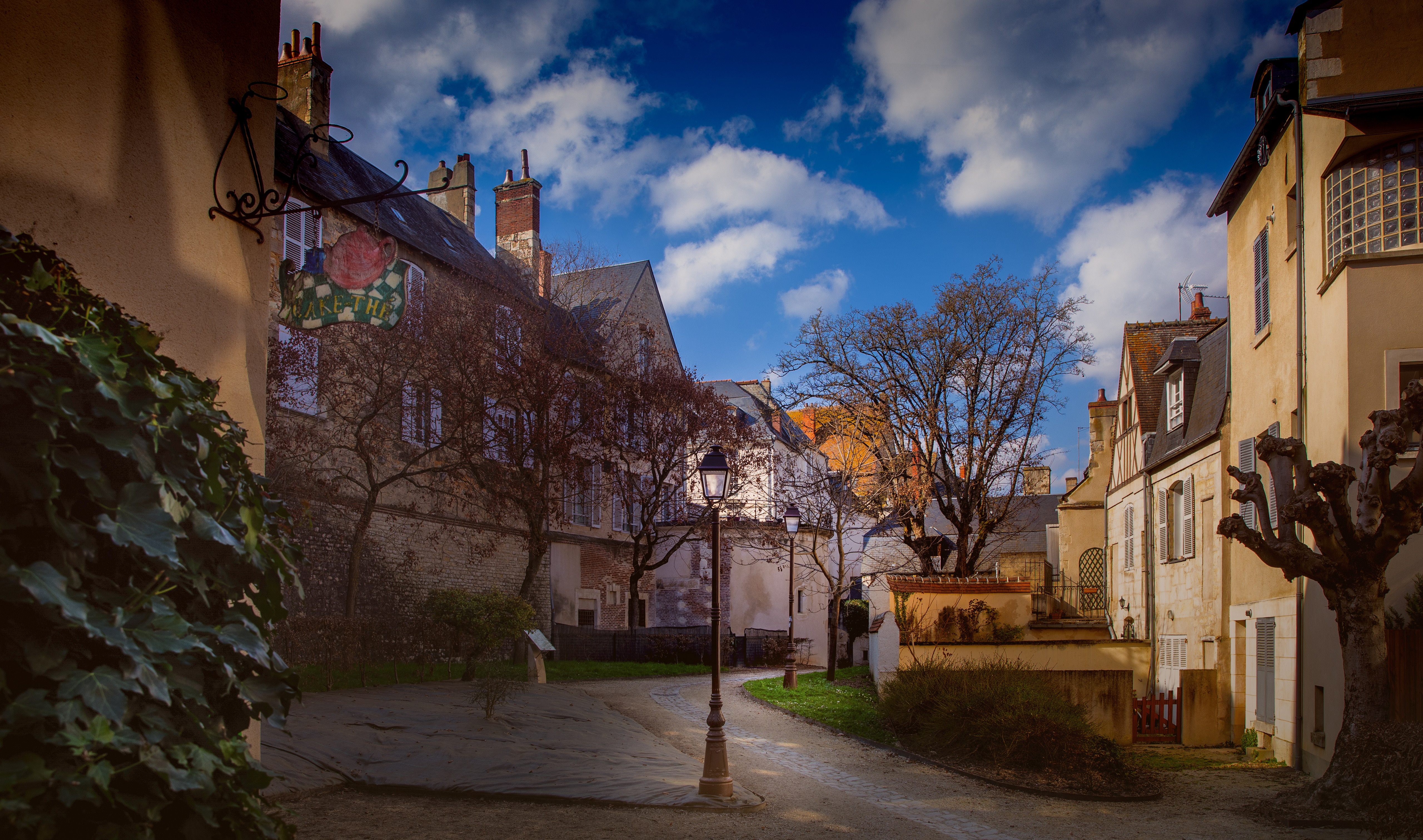 Street in Bourges, France with houses and street lights HD Wallpaper