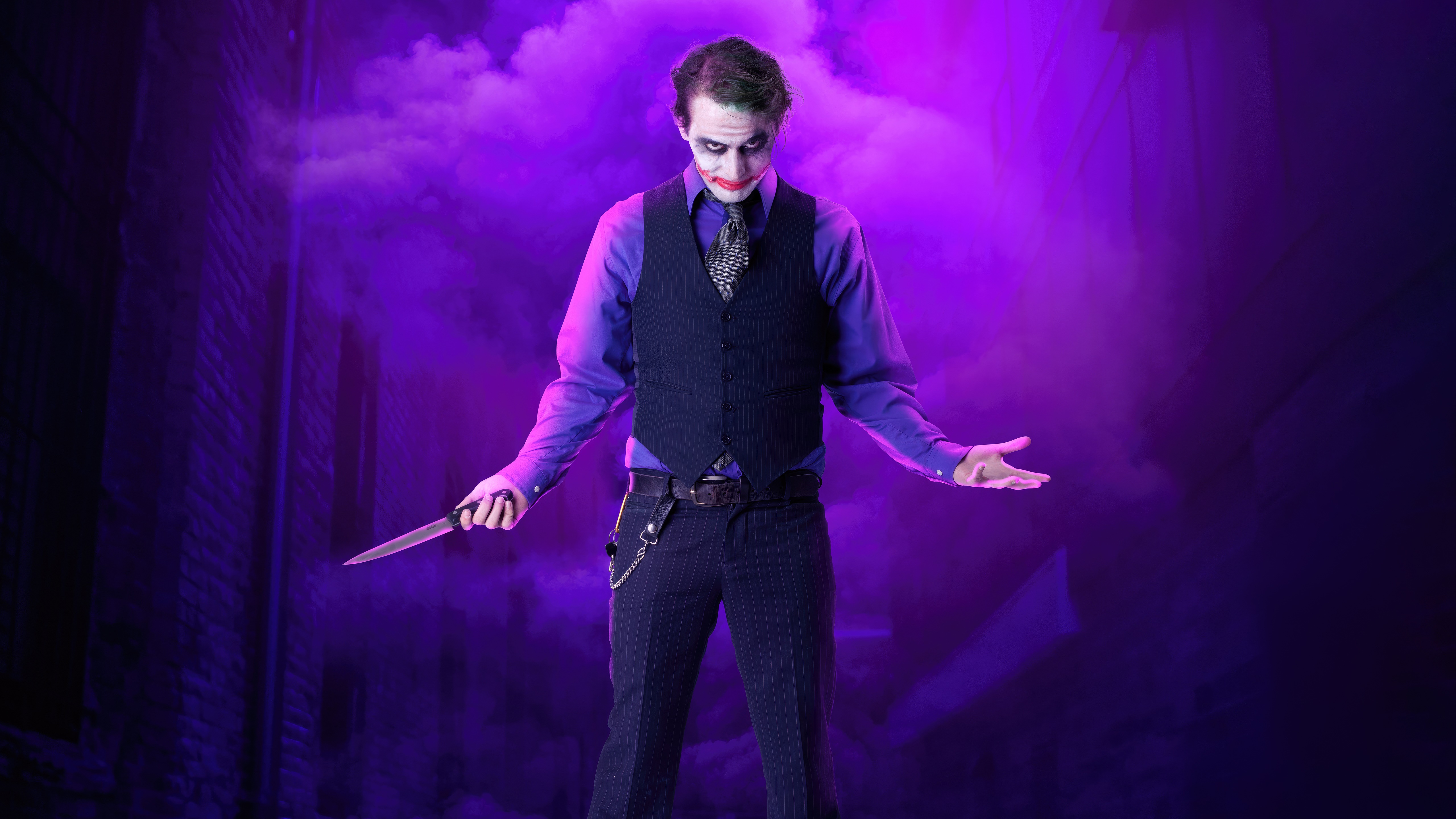 Joker Cosplayer Holding a Knife HD Wallpaper