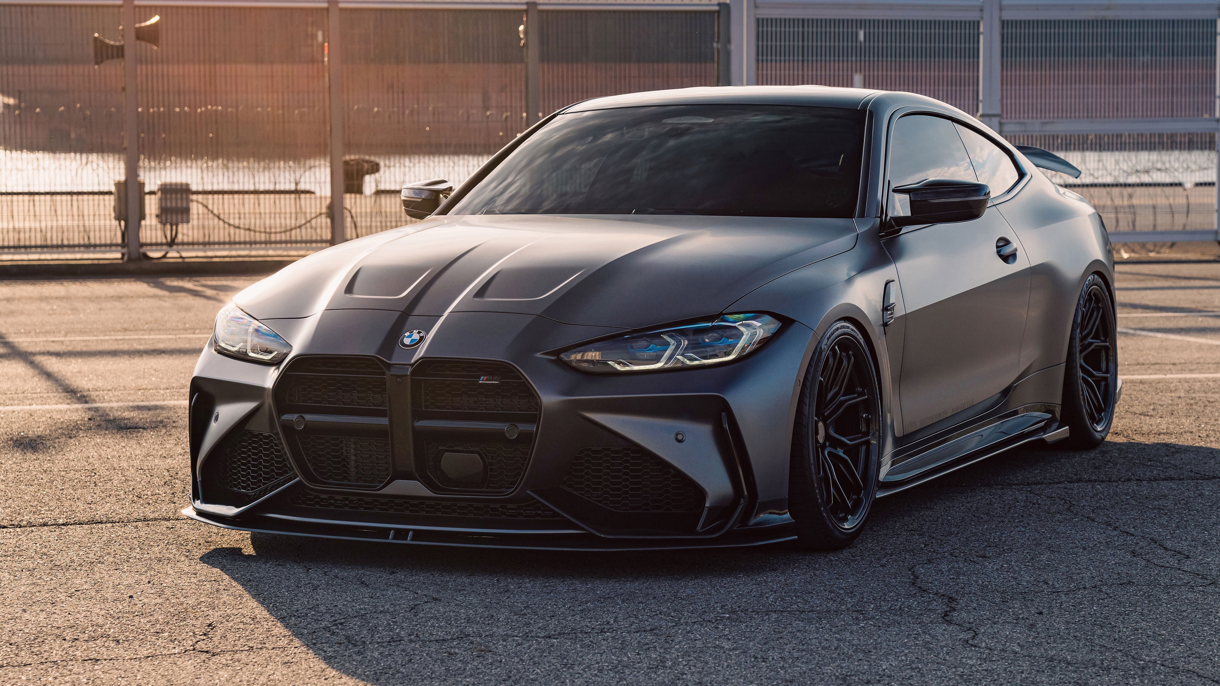 Matte gray BMW M4 coupe with custom body kit HD Wallpaper