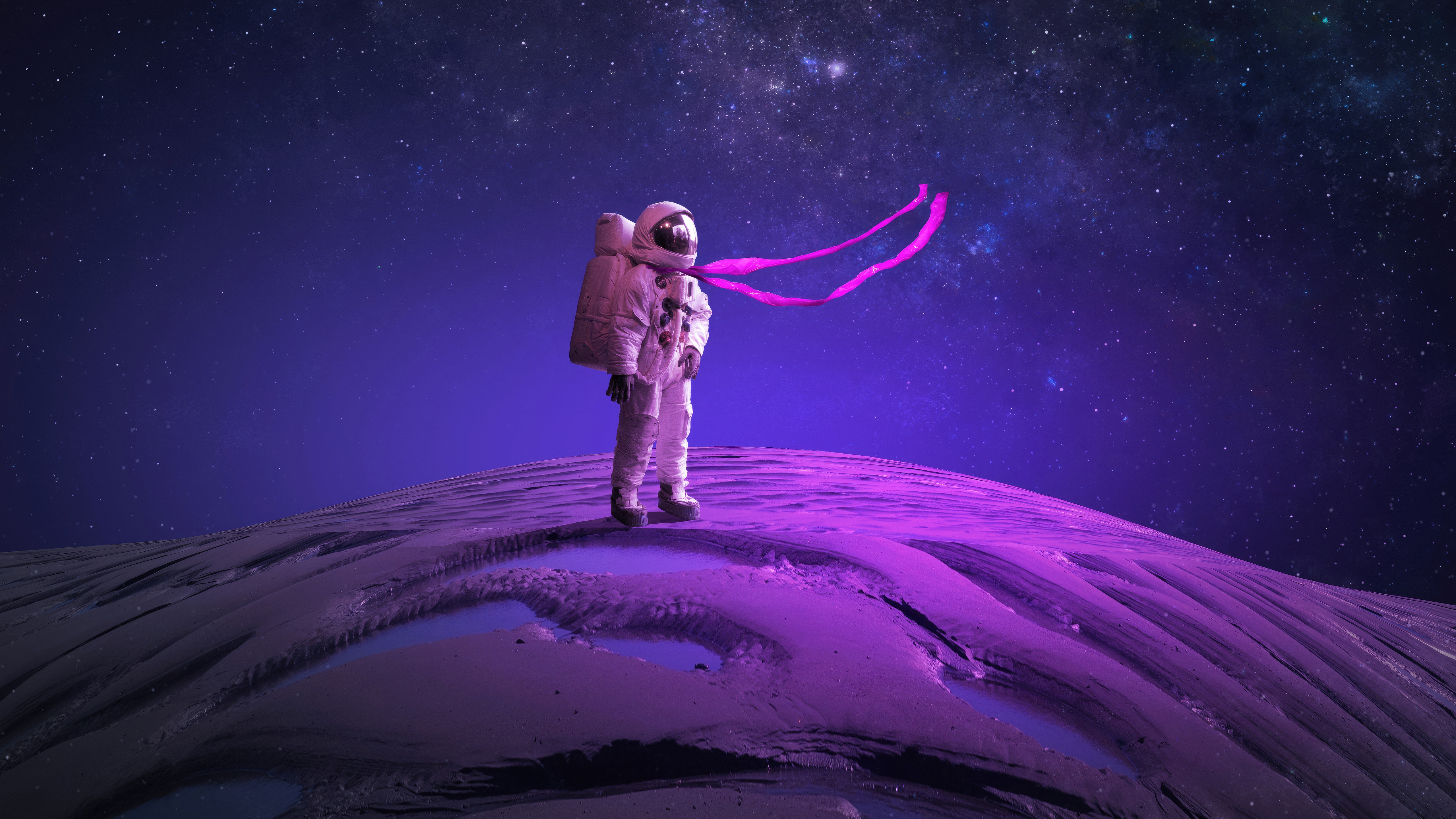 Astronaut on alien planet with pink scarf and starry sky HD Wallpaper