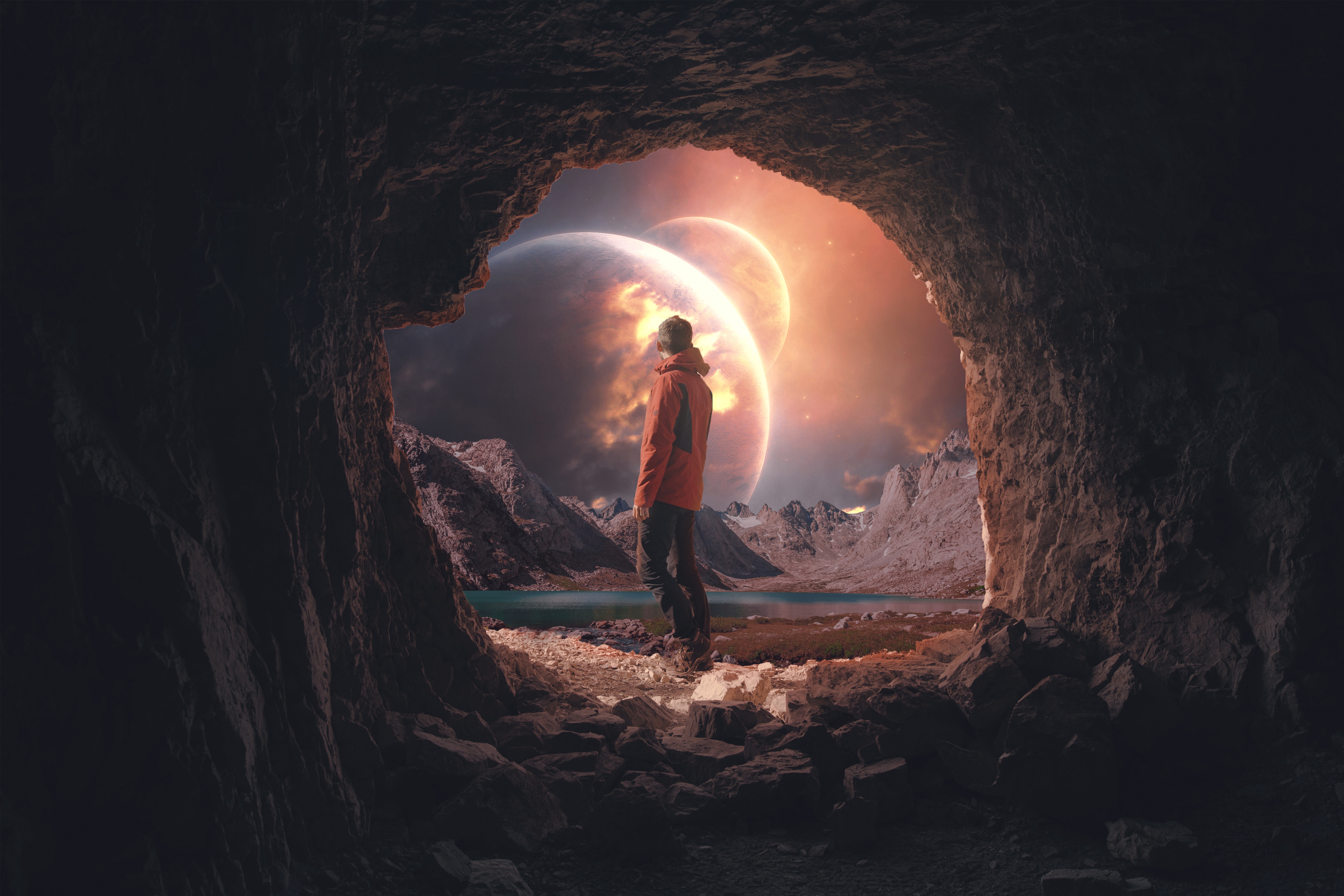 Man in cave looking at alien planets HD Wallpaper