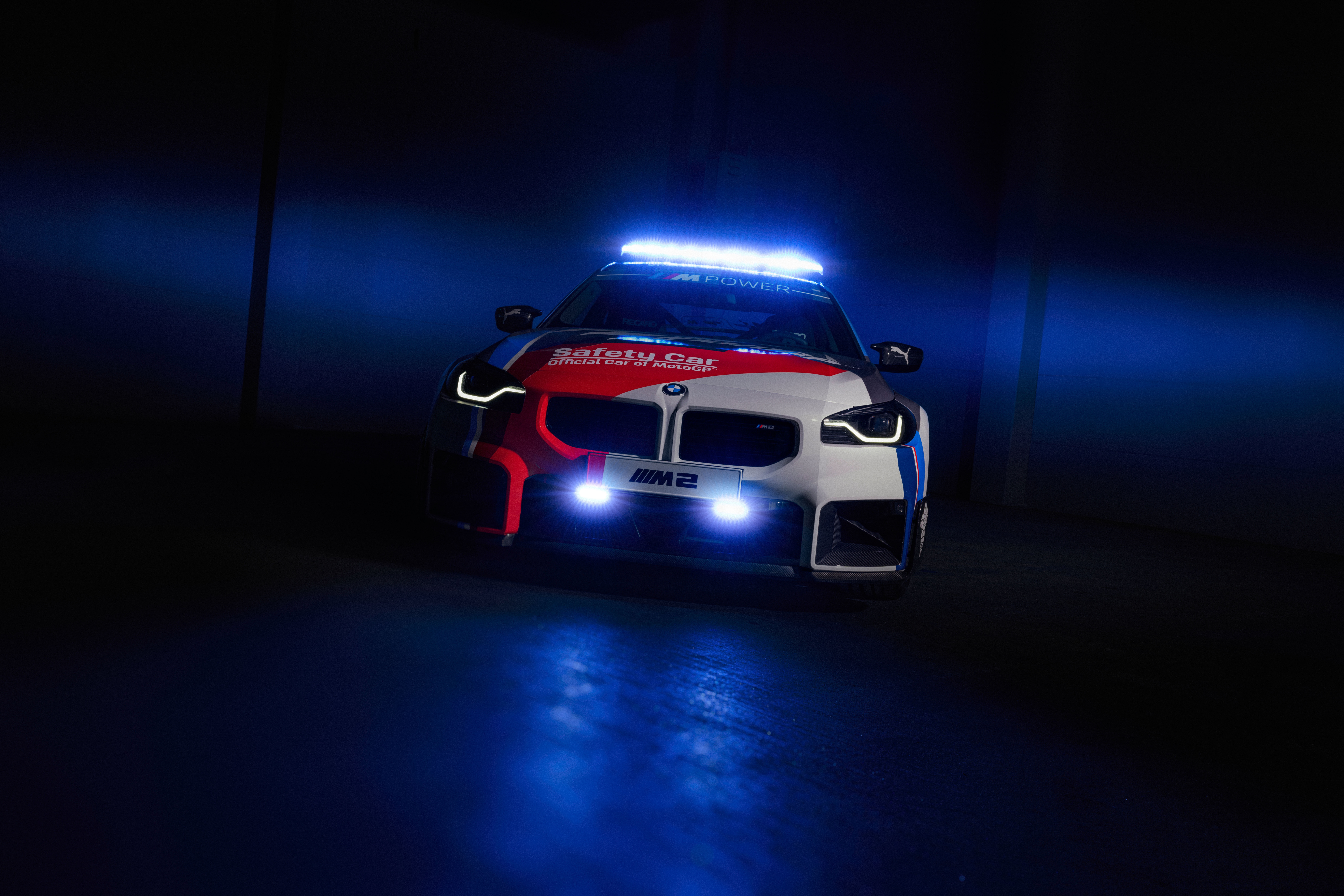 BMW M2 Safety Car with Blue Lights HD Wallpaper