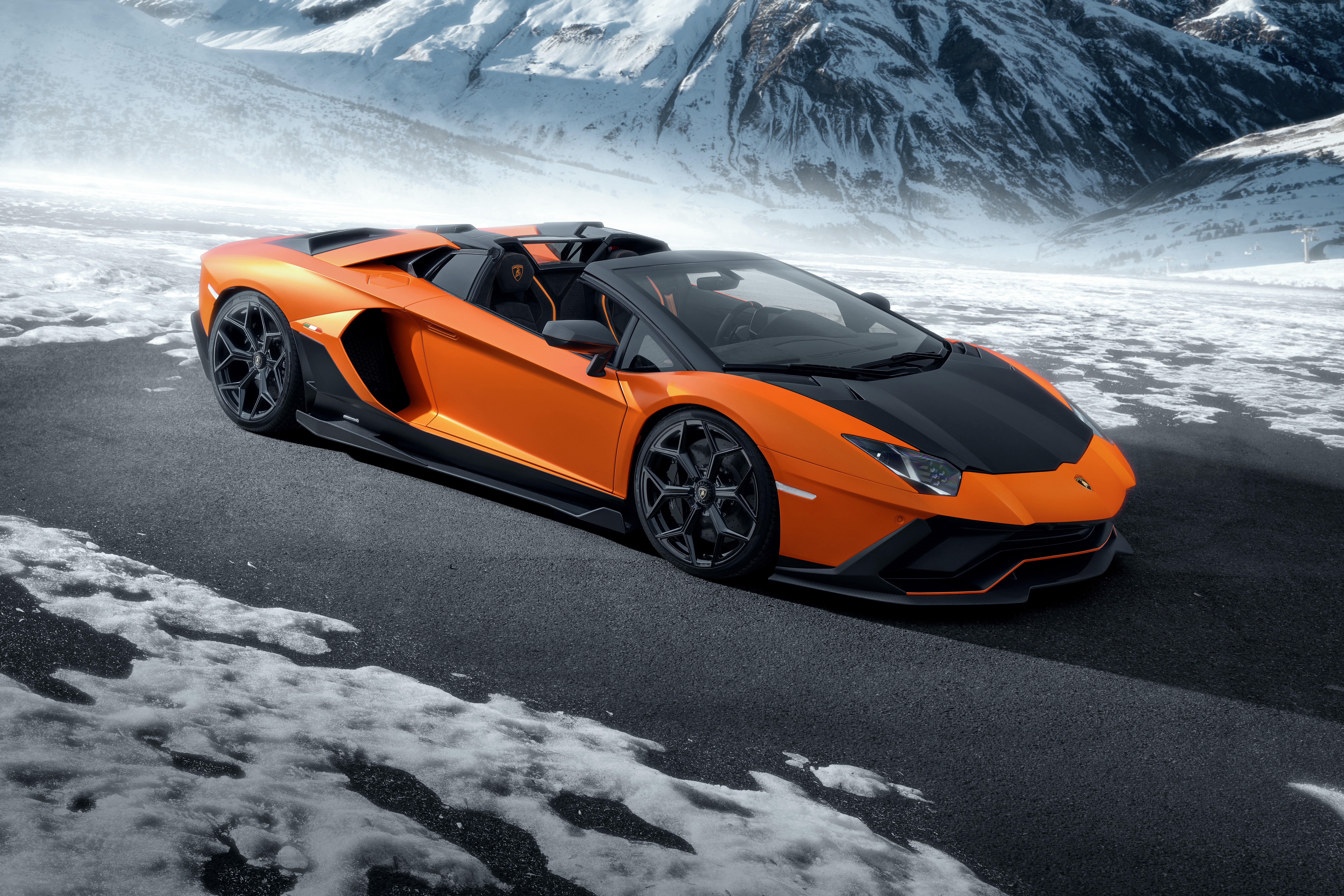 Orange Lamborghini Aventador Roadster in Snowy Mountains HD Wallpaper