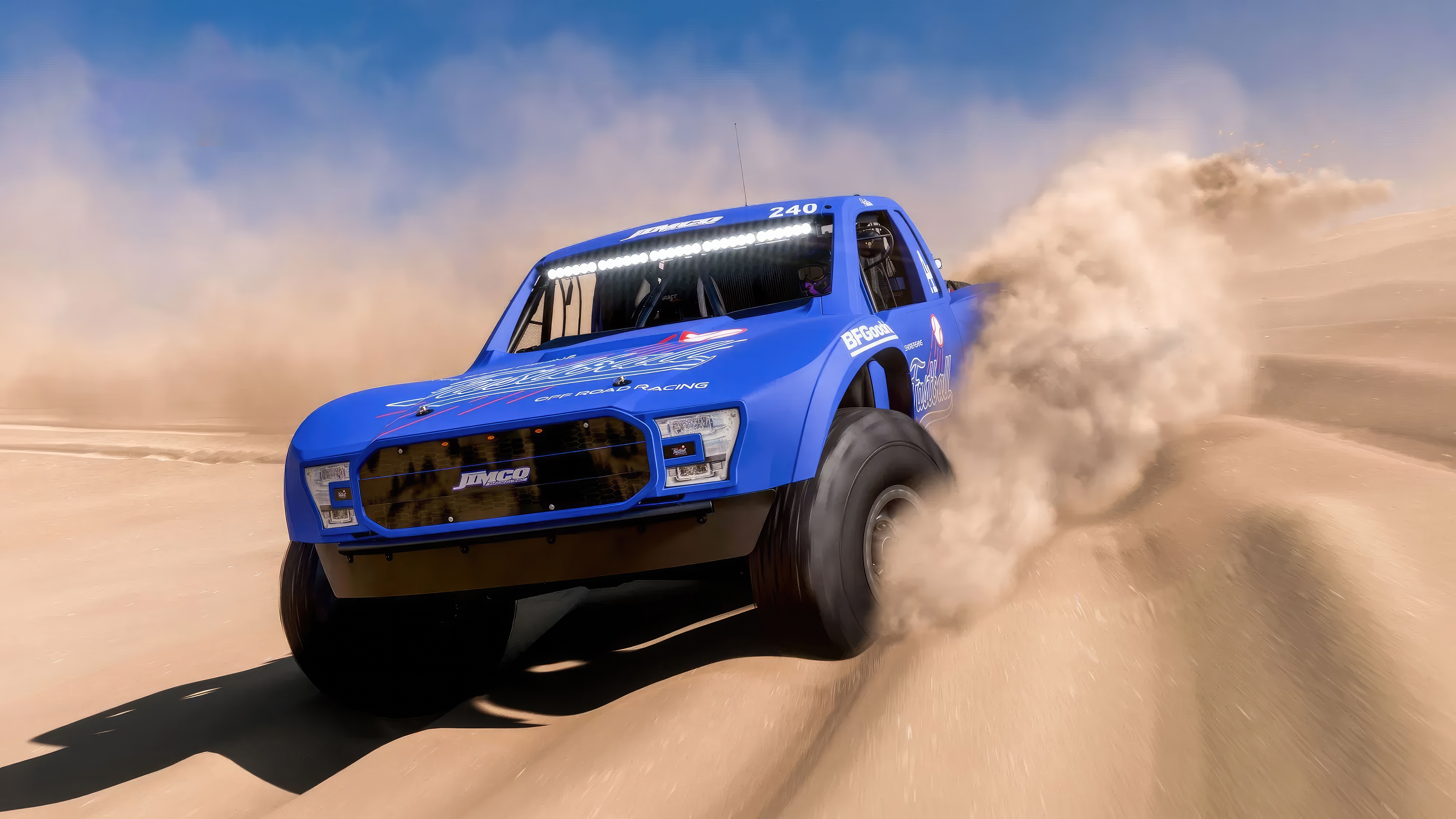 Blue off-road racing truck in desert dunes HD Wallpaper