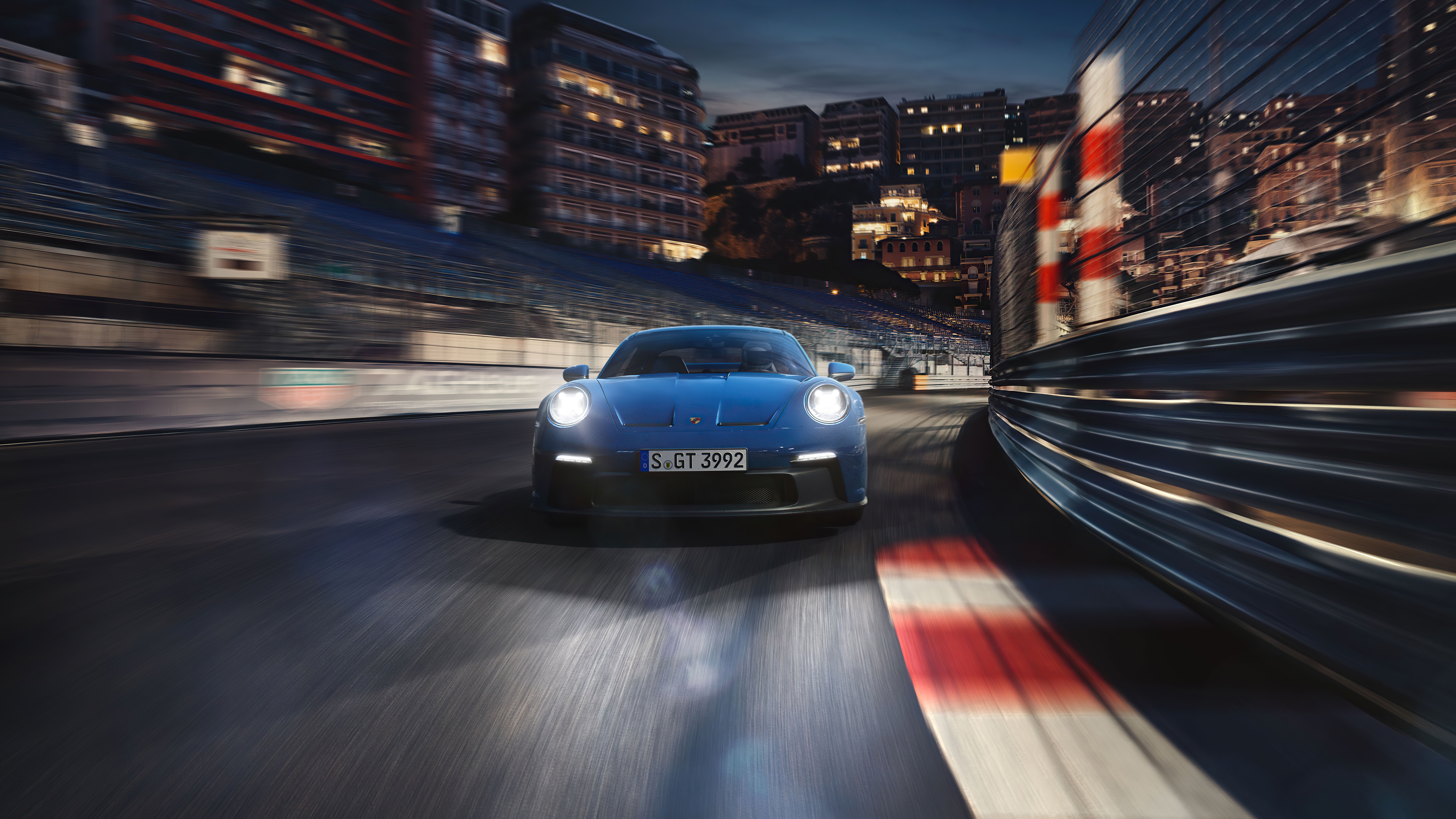 Blue Porsche 911 GT3 on a race track at night HD Wallpaper