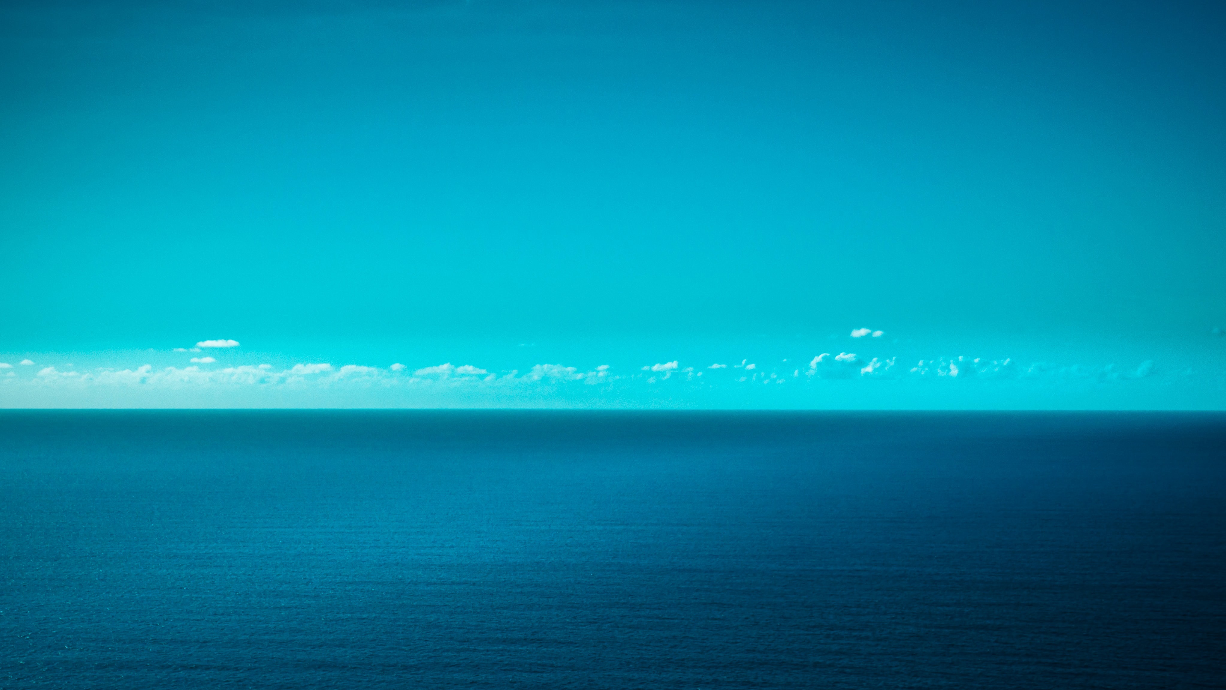 Vast Ocean and Sky Horizon 4K HD Wallpaper