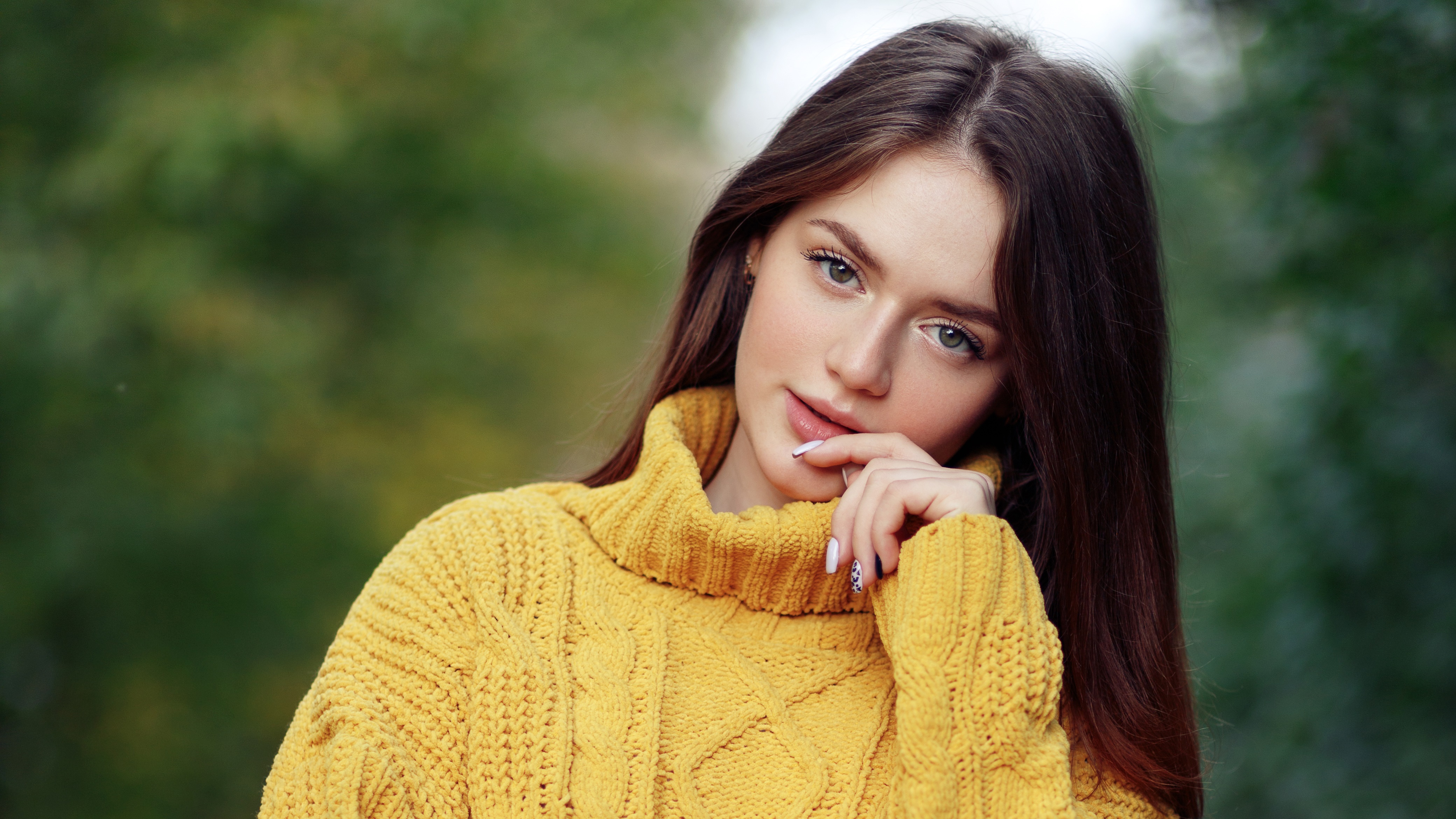 Young woman in yellow sweater outdoors HD Wallpaper