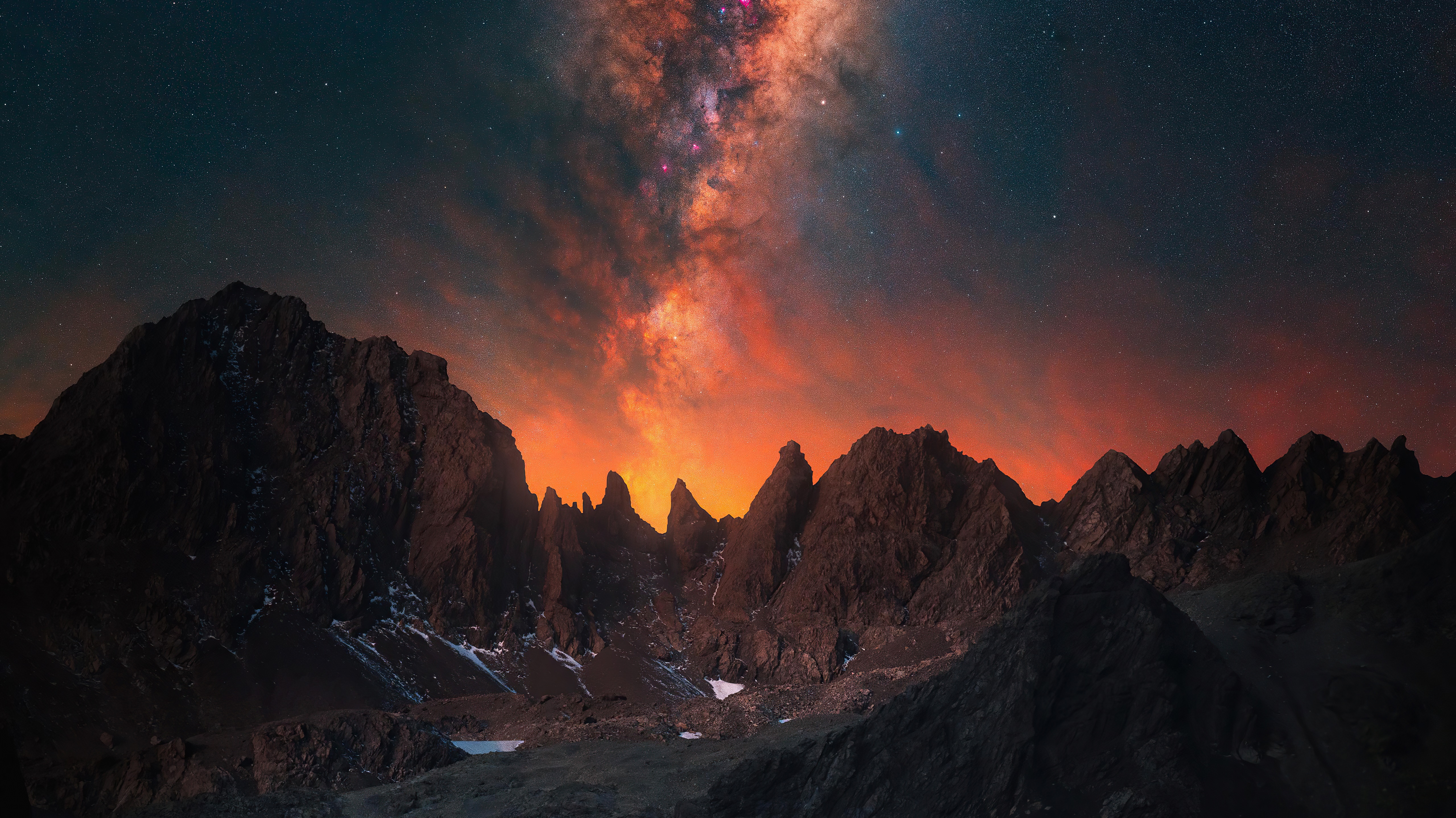 Milky Way over jagged mountains at night HD Wallpaper