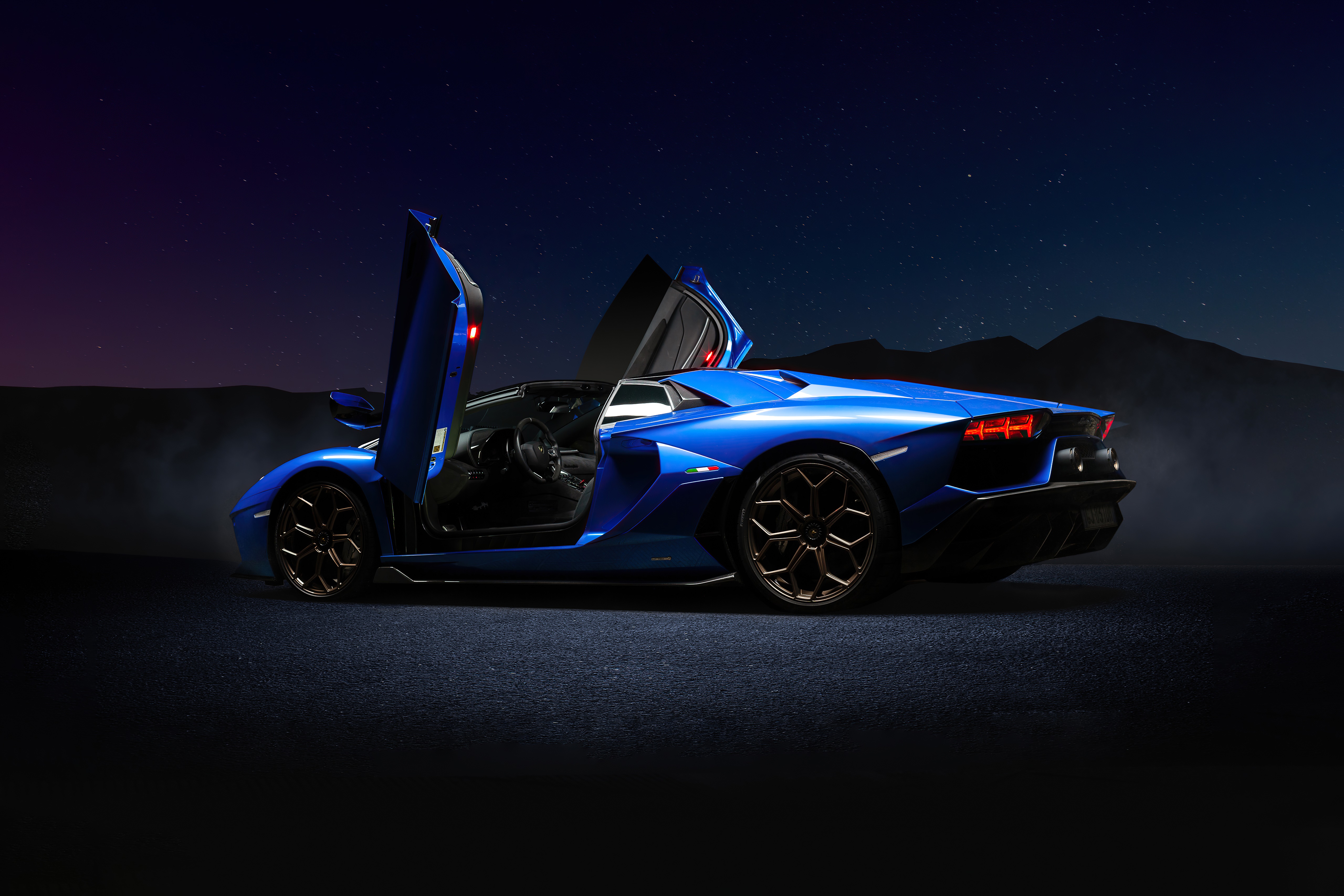 Blue Lamborghini Aventador with Doors Open Under Stars HD Wallpaper
