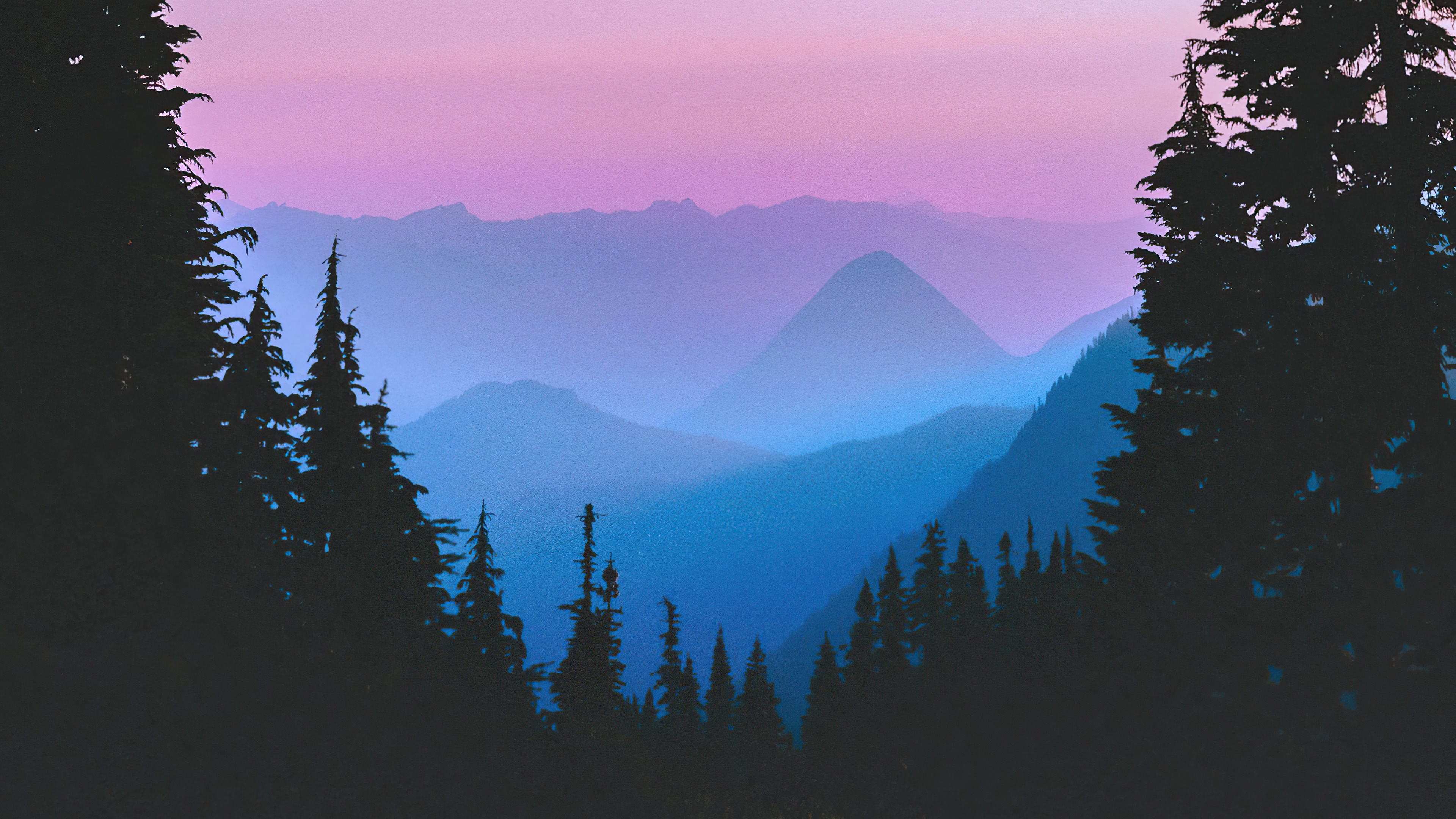 Silhouetted trees against purple and blue mountain layers HD Wallpaper