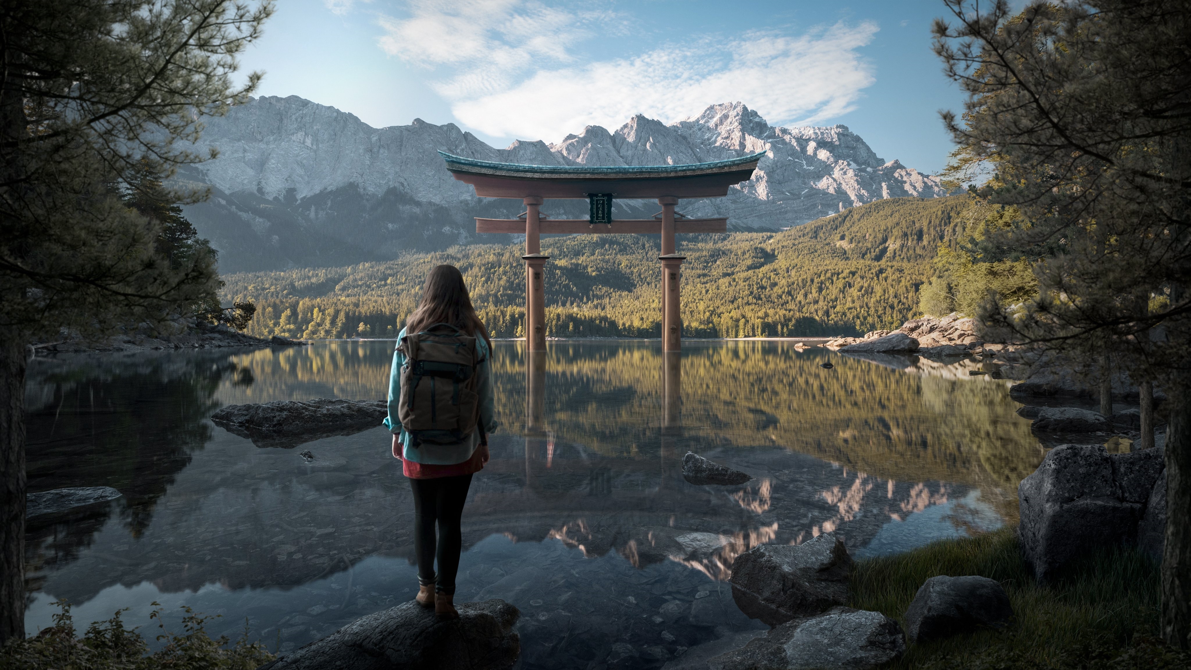 Woman with backpack at lake with torii gate and mountains HD Wallpaper