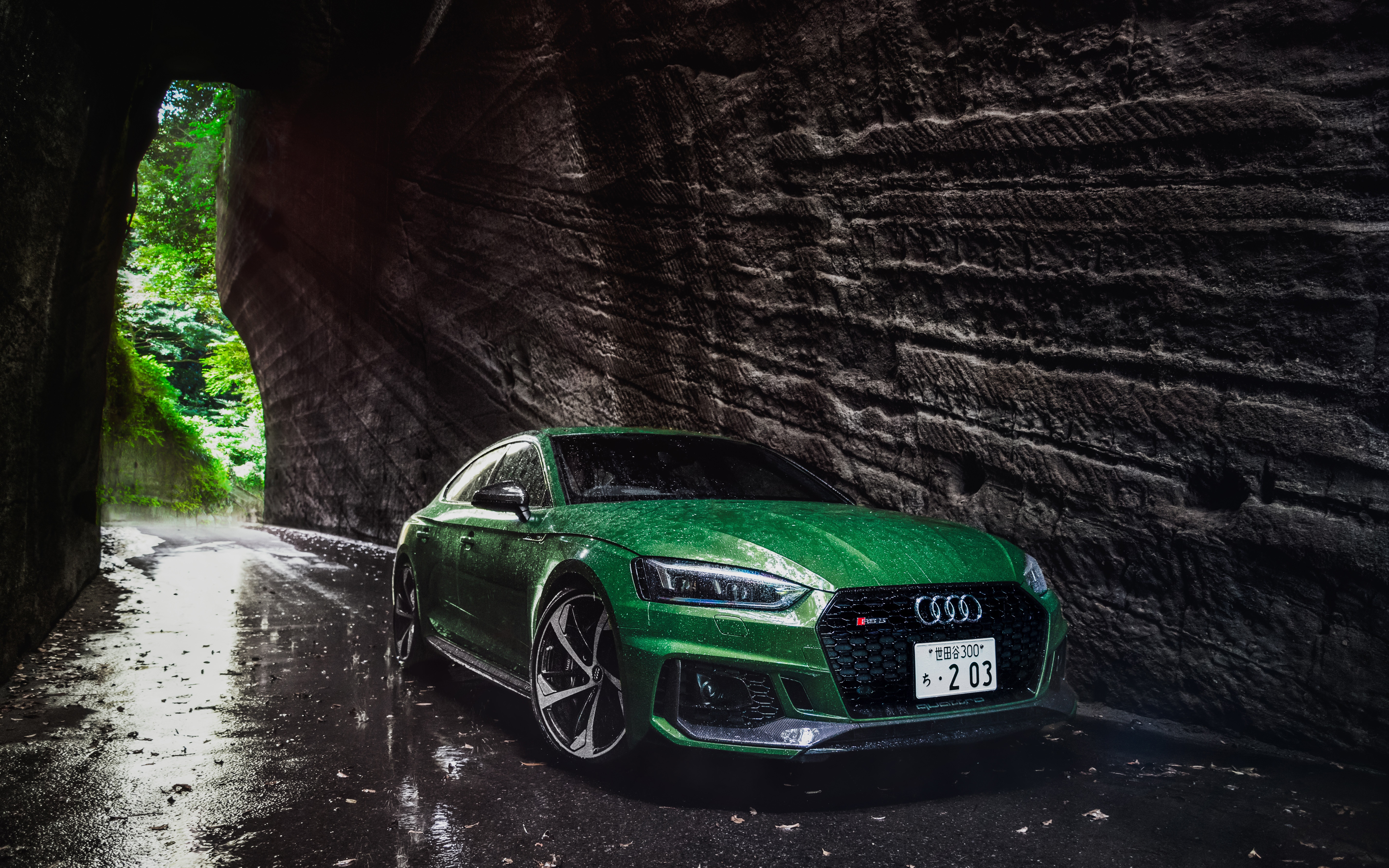 Green Audi RS 5 in a rocky tunnel HD Wallpaper