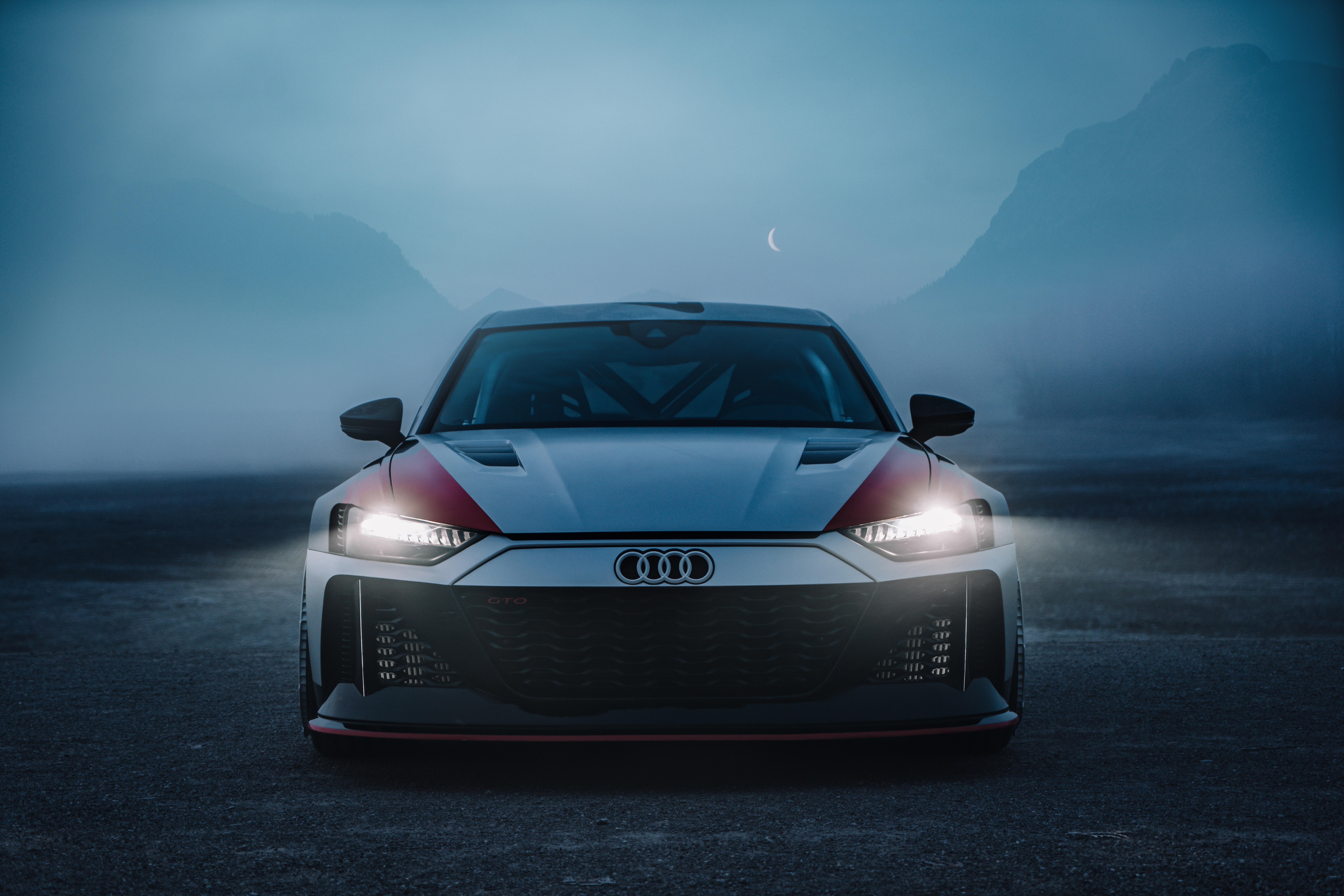 Audi RS6 Avant in a foggy landscape HD Wallpaper