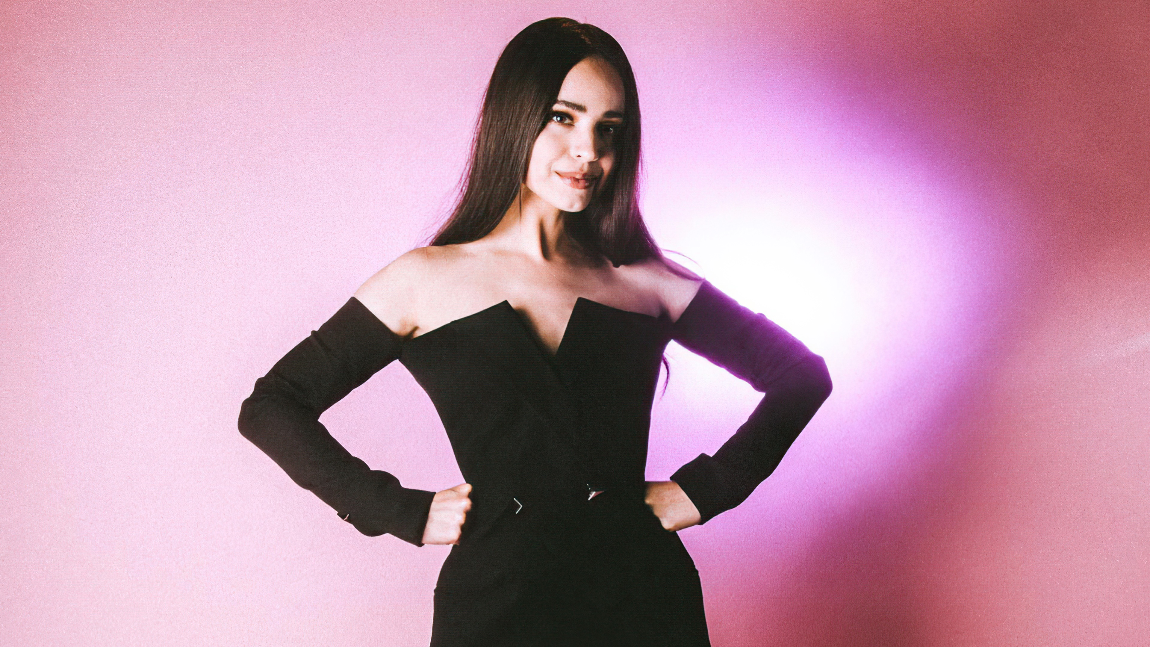 Sofia Carson in a black off-the-shoulder dress HD Wallpaper