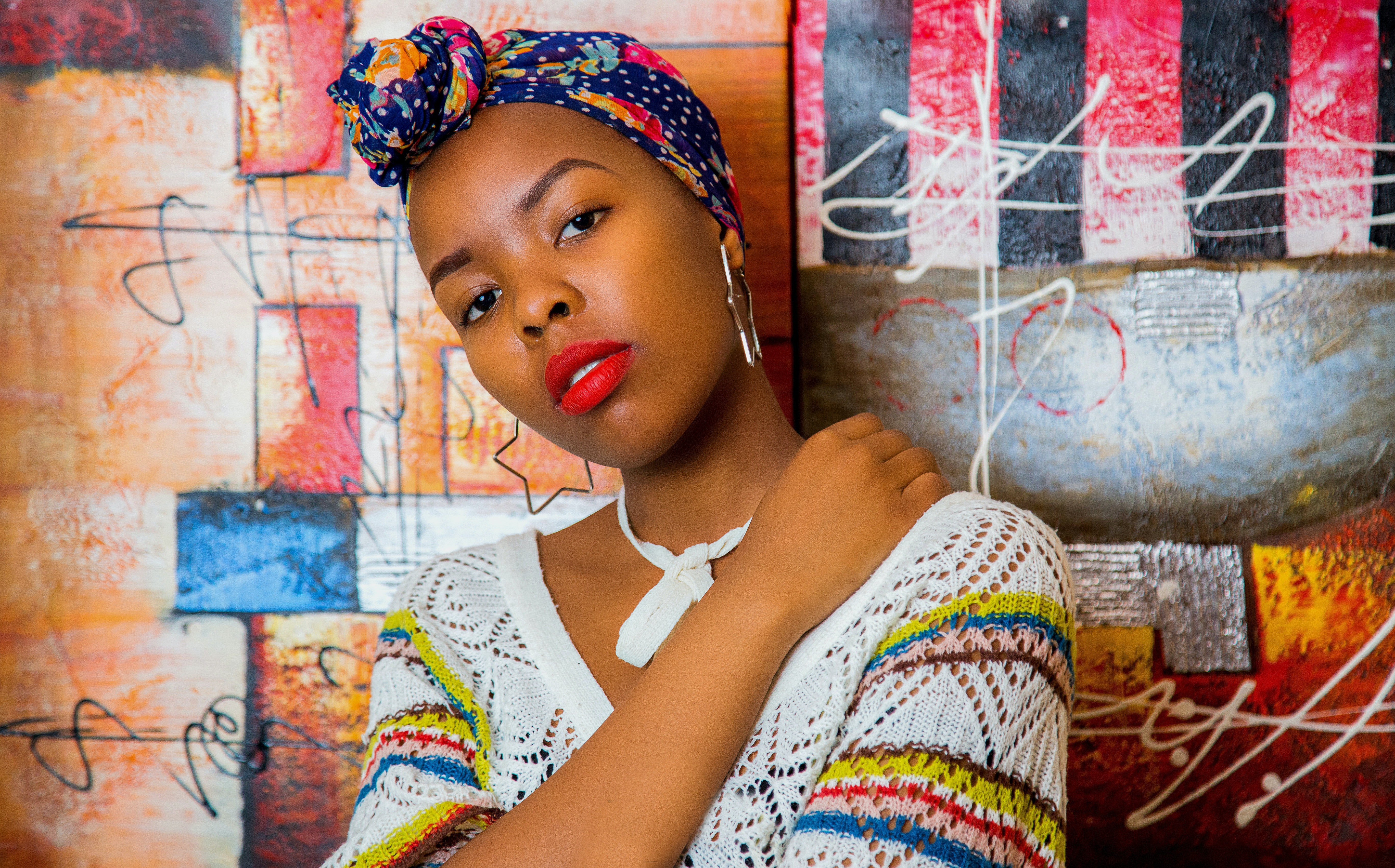 Model with red lipstick and colorful headwrap 4K HD Wallpaper