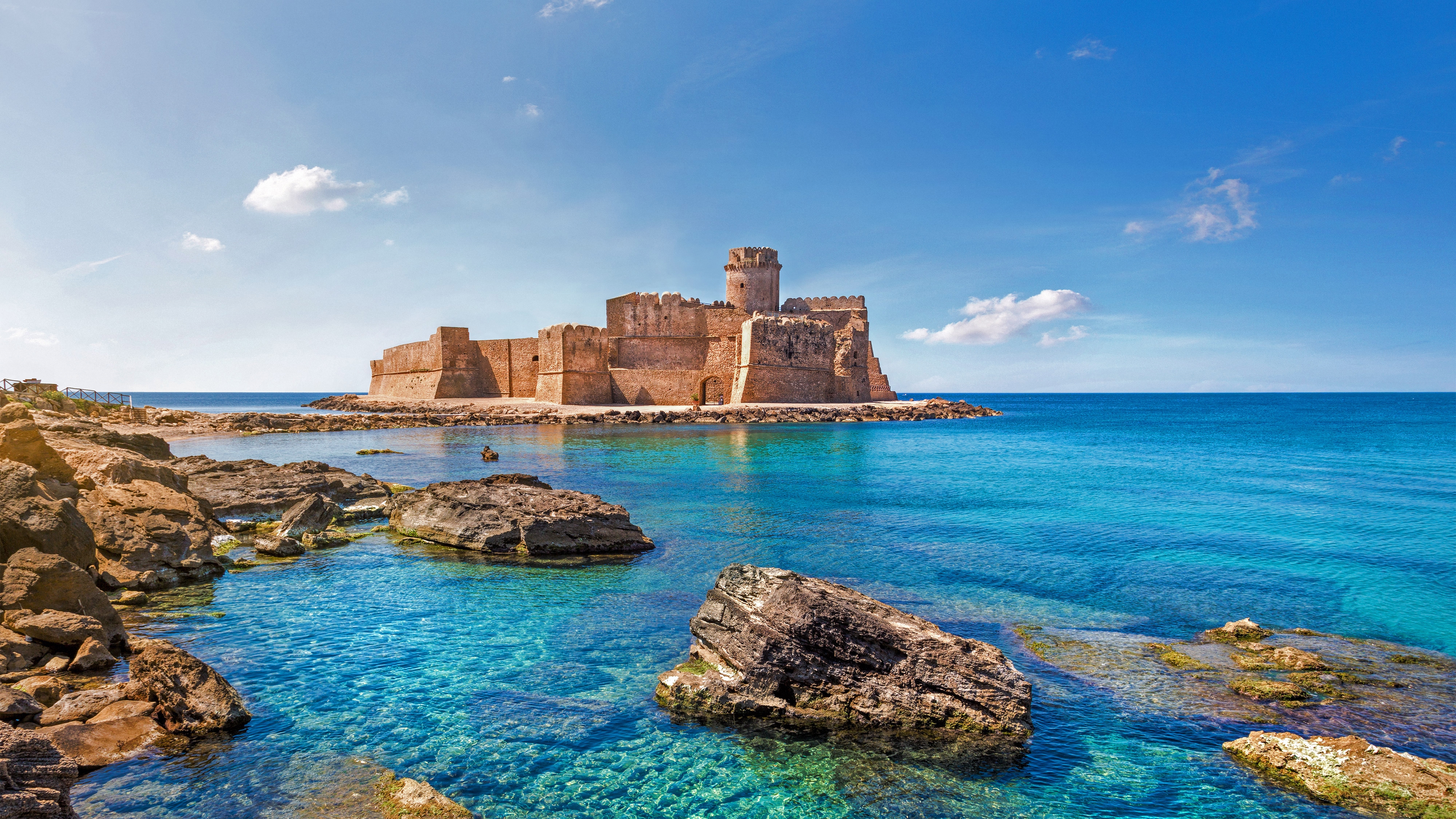 Le Castella castle on the clear blue sea in Italy HD Wallpaper