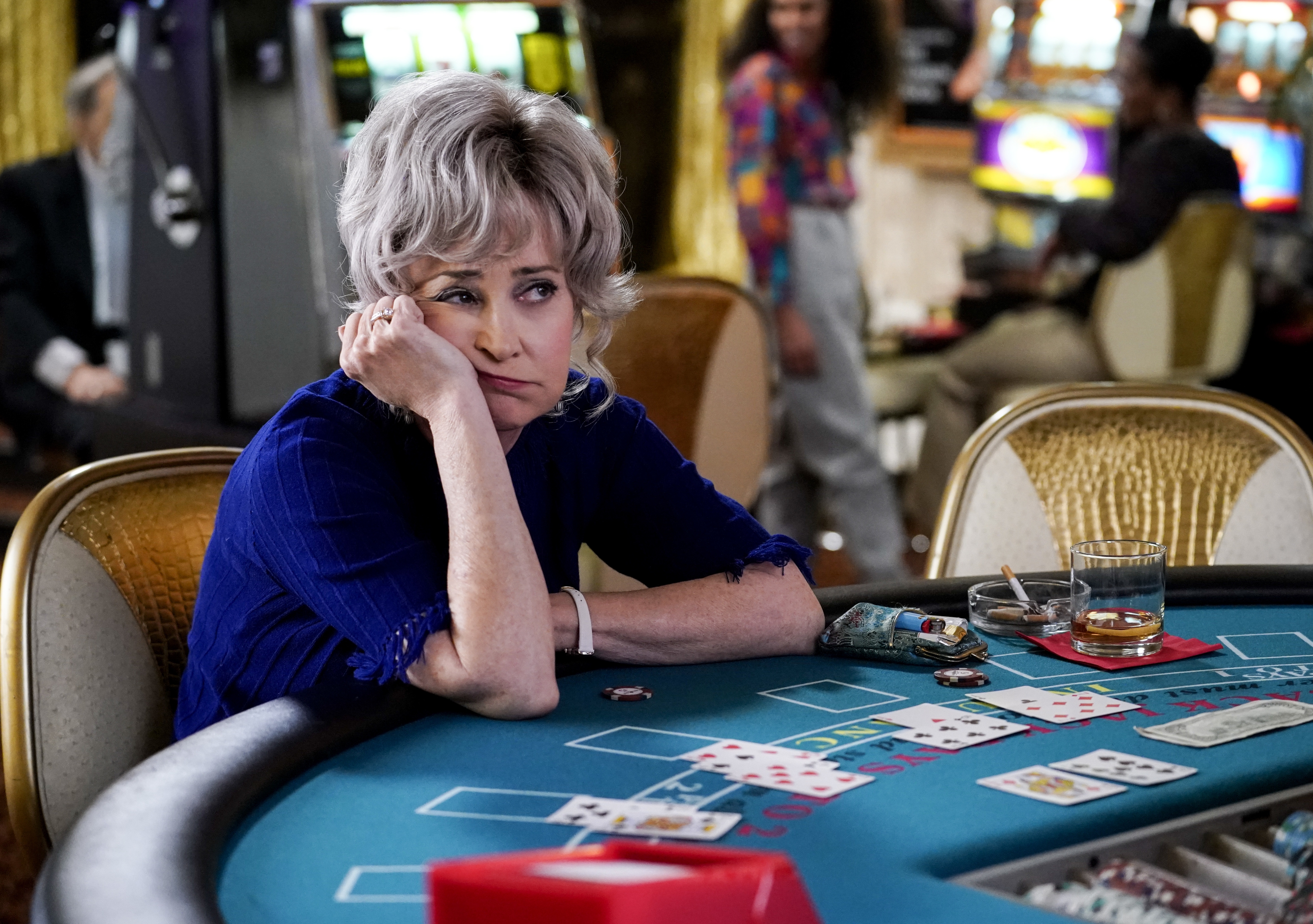 Annie Potts as Constance Tucker bored at casino table HD Wallpaper
