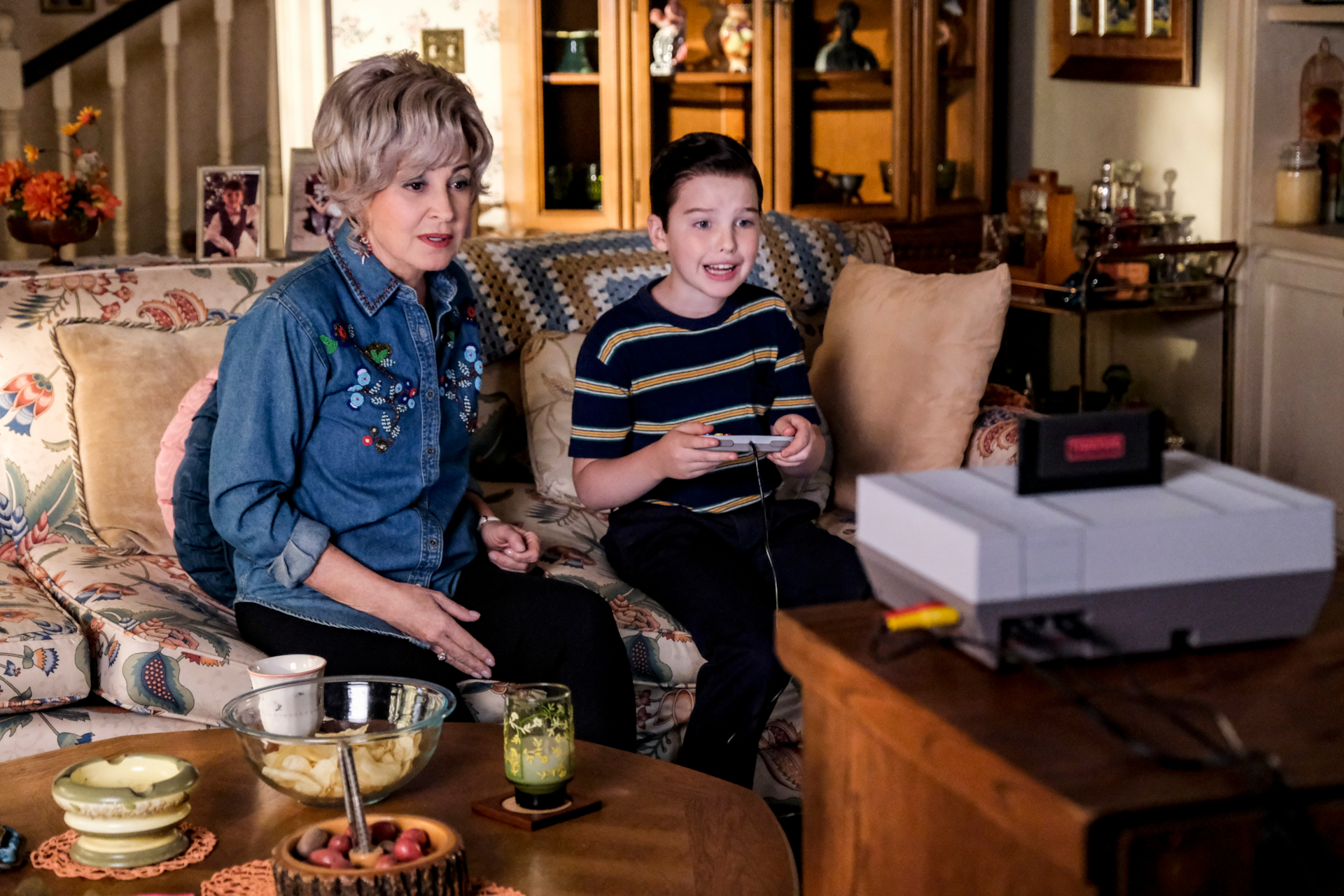 Young Sheldon and Constance Tucker playing video games HD Wallpaper
