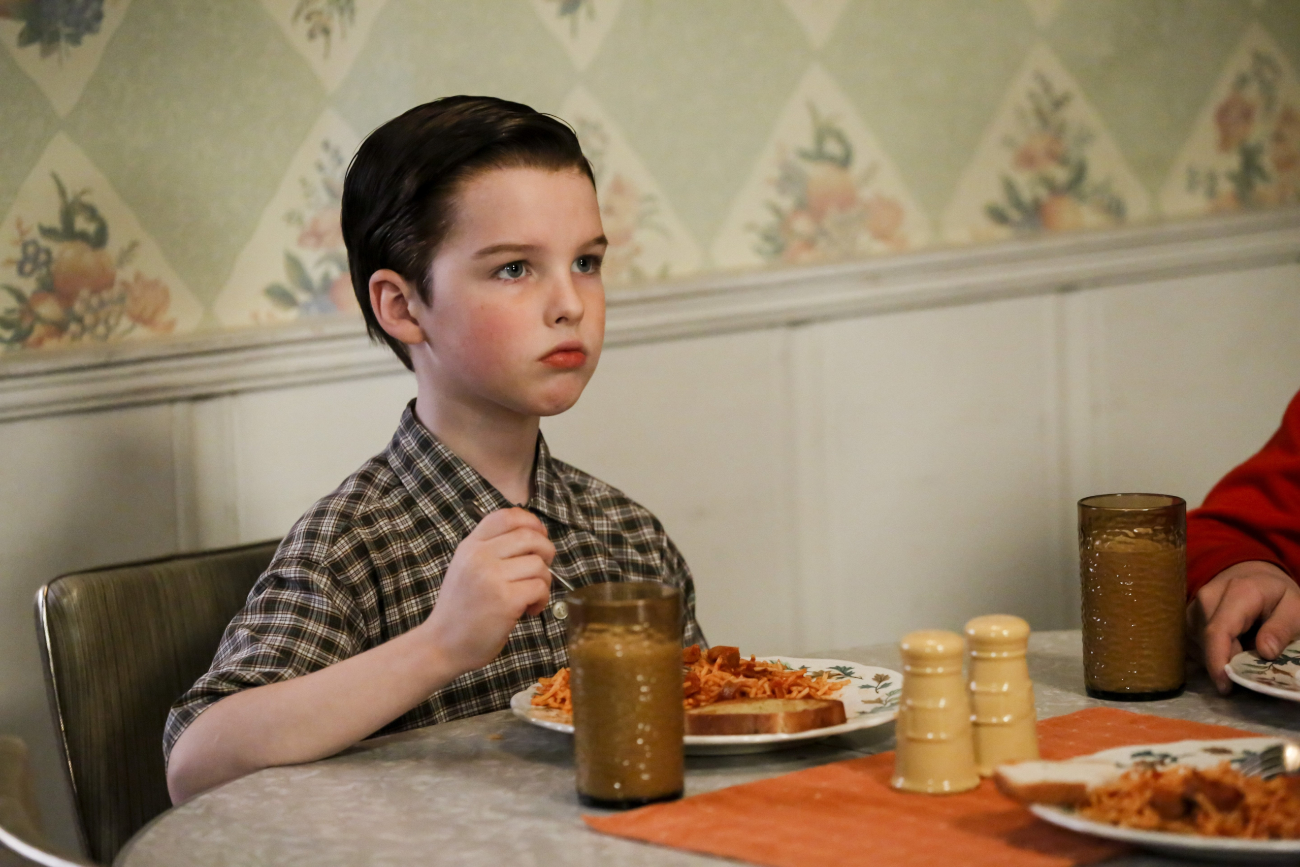 Young Sheldon Cooper at the dinner table HD Wallpaper